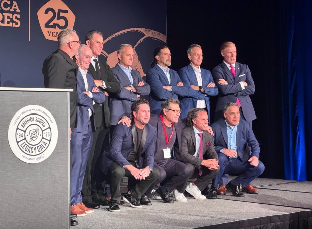 Members of the 1994 U.S. men's national soccer team pose on stage at the Signia by Hilton hotel in downtown San Jose during a fundraising gala for America Scores on Friday, May 8, 2026. (Sal Pizarro/Bay Area News Group)