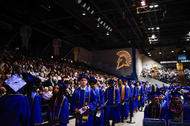 Graduates stand in line during The Lucas College and Graduate School of Business graduation ceremony at SJSU in San Jose, Calif., on Thursday, May 21, 2026. (Shae Hammond/Bay Area News Group)