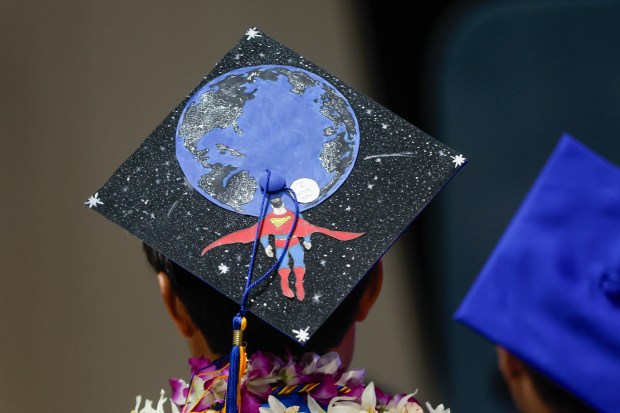 A graduate wears a Superman themed graduation cap during The Lucas College and Graduate School of Business graduation ceremony at SJSU in San Jose, Calif., on Thursday, May 21, 2026. (Shae Hammond/Bay Area News Group)