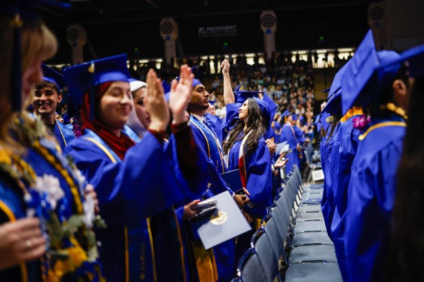 Graduates celebrate after The Lucas College and Graduate School of Business graduation ceremony at SJSU in San Jose, Calif., on Thursday, May 21, 2026. (Shae Hammond/Bay Area News Group)