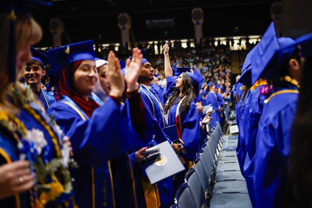 Graduates celebrate after The Lucas College and Graduate School of Business graduation ceremony at SJSU in San Jose, Calif., on Thursday, May 21, 2026. (Shae Hammond/Bay Area News Group)
