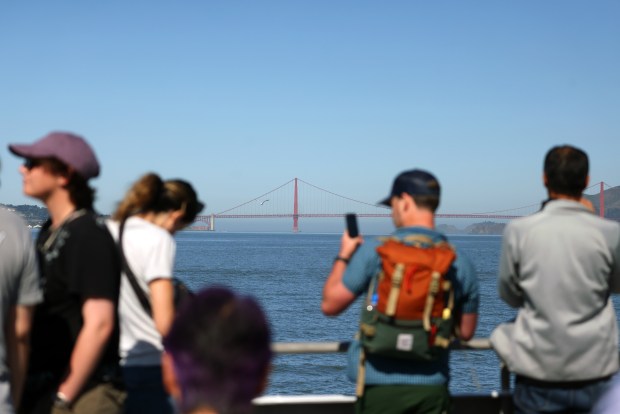 Visitors view the Golden Gate Bridge from a Golden Gate Ferry en route to Angel Island on Tuesday, May 19, 2026 near San Francisco, Calif. (Aric Crabb/Bay Area News Group)