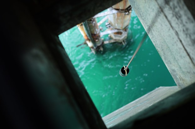 San Diego, CA_5_7_26_Brent Fish, an aquarist at Birch Aquarium at Scripps Institute, takes the surface and the sea bottom temperature by using probes lowered from a hatch which opens over Scripps Pier. A strong El Niño is affecting the water temperature of the Eastern Pacific. Photo by John Gastaldo for the Union-Tribune