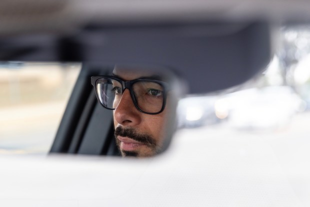 Ammar Campa-Najjar drives to a neighborhood of Escondido as he prepares to canvass on Tuesday, May 12, 2026. (Luke Johnson / The San Diego Union-Tribune)