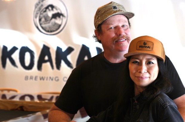 Oceanside, CA 5_19_2026_Mike Aubuchon, left and Tomomi are owners of Koakai Brewing in Oceanside. They are a married couple who met while working at Pizza Port's Carlsbad Village location. He brews award-winning beers and she pours those largely hoppy offerings at the bar. The brewpub is a next-door addition to their other business, Kyoto Japanese Market. Koakai Brewing introduces various West Coast IPAs intermingled with a wide-ranging array of low-alcohol, international-style lagers as well as Japanese- and Hawaiian-inspired barbecue, sushi, and izakaya-style items to go with the market's grab-and-go fare. Photo by John Gastaldo for the Union-Tribune