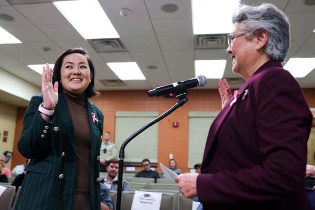 Shirley Nakawatase, right, swore in her daughter Mariko Nakawatase, left, as an Imperial Beach City Council member at Imperial Beach City Hall on Wednesday, Oct. 15, 2025. (Meg McLaughlin / The San Diego Union-Tribune)