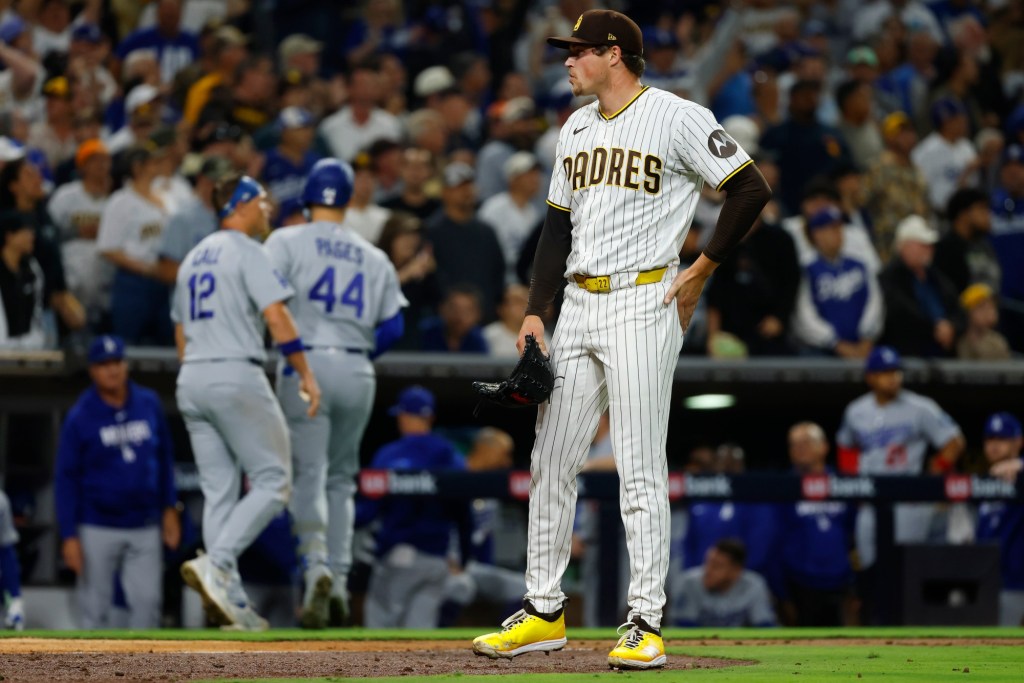 Wild throw in ninth inning allows Dodgers to even series with Padres