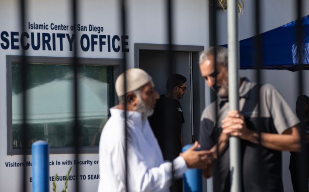 San Diego, CA - Community members speak in front of the recently funded security center at the San Diego Islamic Center in San Diego on Friday, May 22, 2026. (Luke Johnson / The San Diego Union-Tribune)