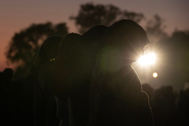 San Diego, CA - People gather and perform the  Maghrib prayer after an evening vigil at Lindberg Park on Tuesday, May 19, 2026, in San Diego, CA. (Luke Johnson / The San Diego Union-Tribune)
