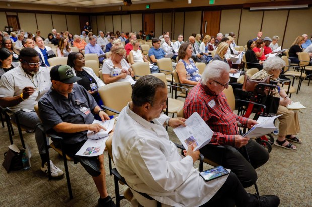 Residents attend the first Measure H forum at Tri-City Medical Center in Oceanside on Oct. 30, 2025. Charlie Neuman / U-T file