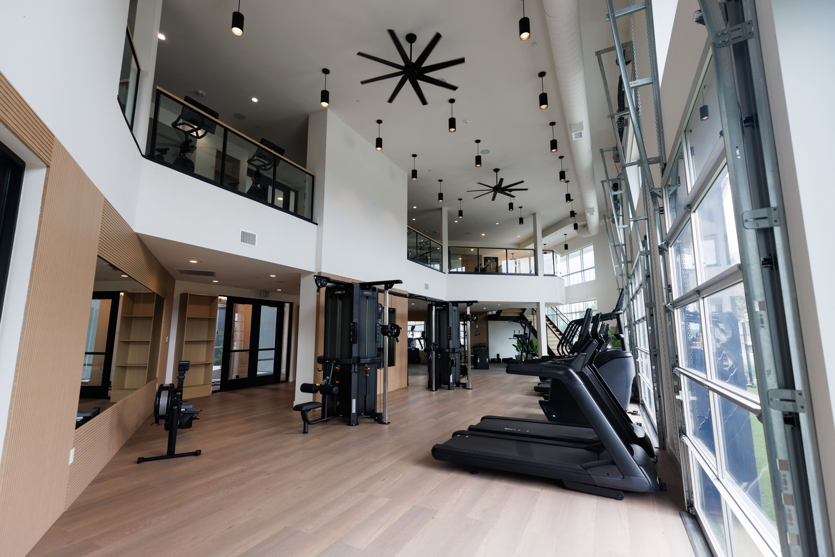 The gym at VAYA apartment complex. It includes a variety...