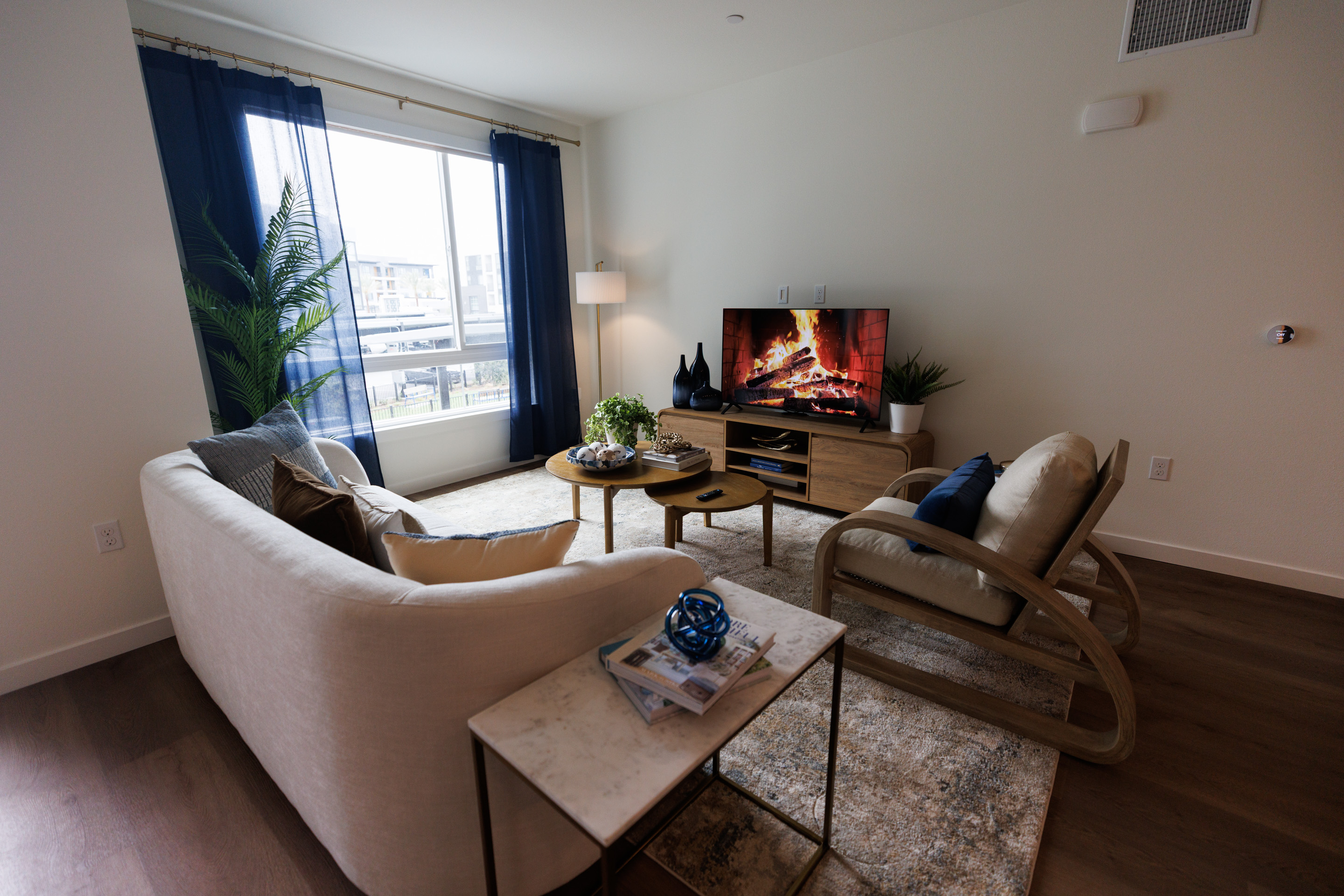 The living room of a two-bedroom apartment at VAYA apartment...