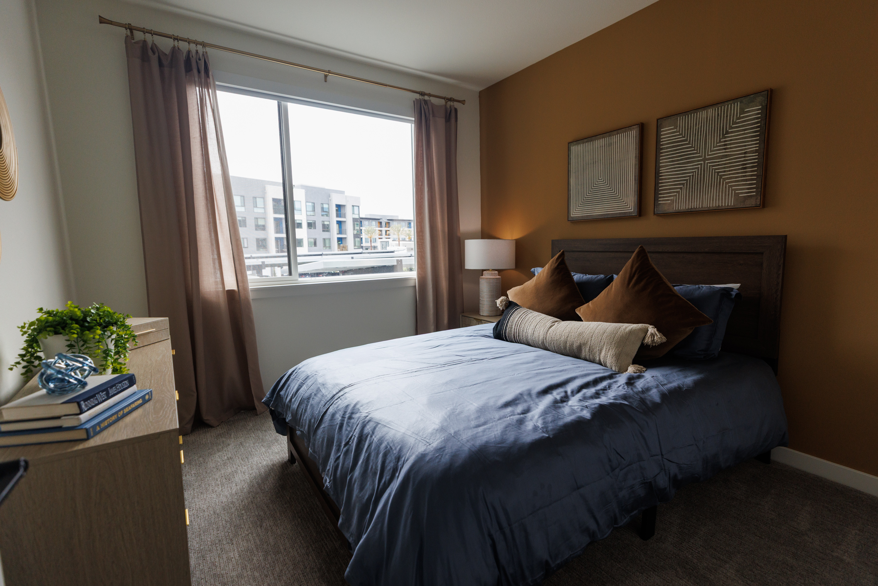 A bedroom of a two-bedroom apartment at VAYA apartment complex...