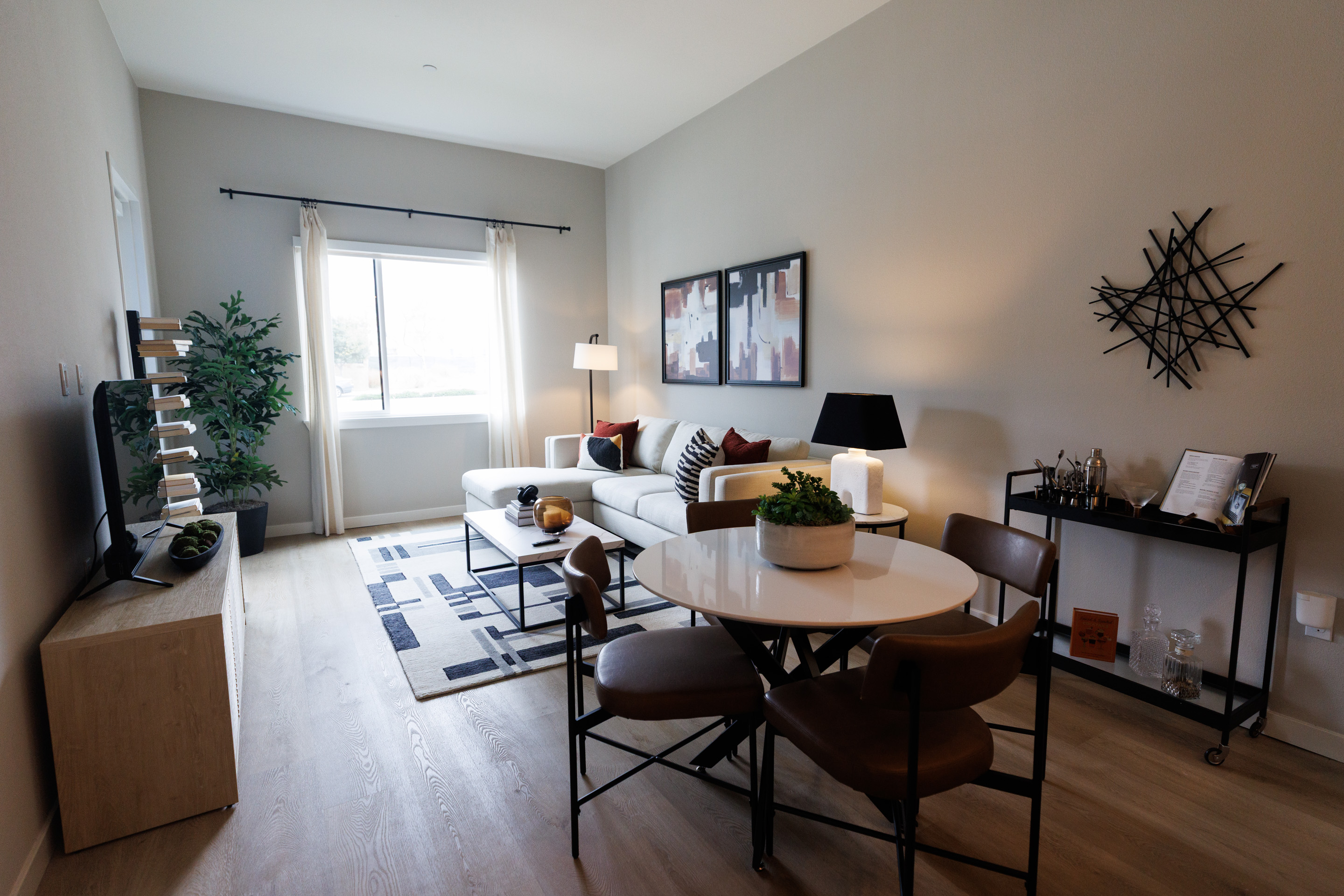 The living room of a one-bedroom apartment at VAYA. (Kristian...