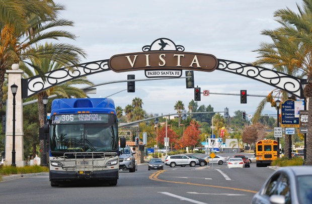 The Vista sign crosses Santa Fe Ave. in Vista in late December. (K.C. Alfred / The San Diego Union-Tribune)