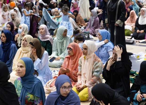 San Diego, CA - Community members come together to pray during the Islamic holiday Eid al-Adha at the San Diego Convention Center on Wednesday, May 27, 2026, in San Diego, CA. The community is coming together to heal during the "Festival of Sacrifice" nine days after the Islamic Center of San Diego was the target of a shooting. (Luke Johnson / The San Diego Union-Tribune)