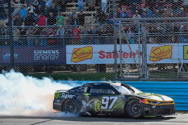 Shane Van Gisbergen (97) does a burnout after winning a NASCAR Cup Series auto race Sunday, May 10, 2026, in Watkins Glen, N.Y. (Photo/Adrian Kraus)