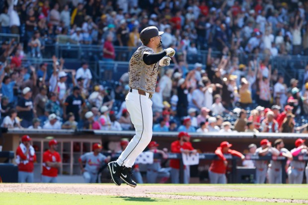 Nick Castellanos #21 of the San Diego Padres watches his two-run home run in the ninth inning against the St. Louis Cardinals at Petco Park on May 10, 2026 in San Diego, CA. (K.C. Alfred / The San Diego Union-Tribune)
