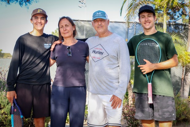 Francis Parker's Ilias and Noah Bouzoubaa and their parents Jaques and Zorica Rahovic at the Pacific Beach Tennis Center on Wednesday, April 15, 2026. (Photo by Sandy Huffaker for The San Diego Union-Tribune)