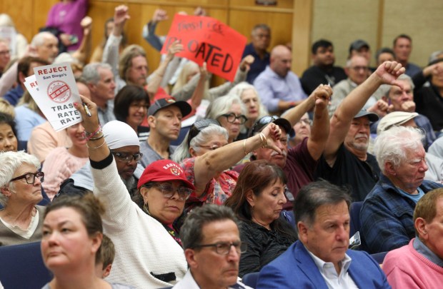 Members of the public express their disapproval of proposed trash pickup fees during a San Diego City Council meeting on Monday, June 9, 2025. (Hayne Palmour IV / For The San Diego Union-Tribune)