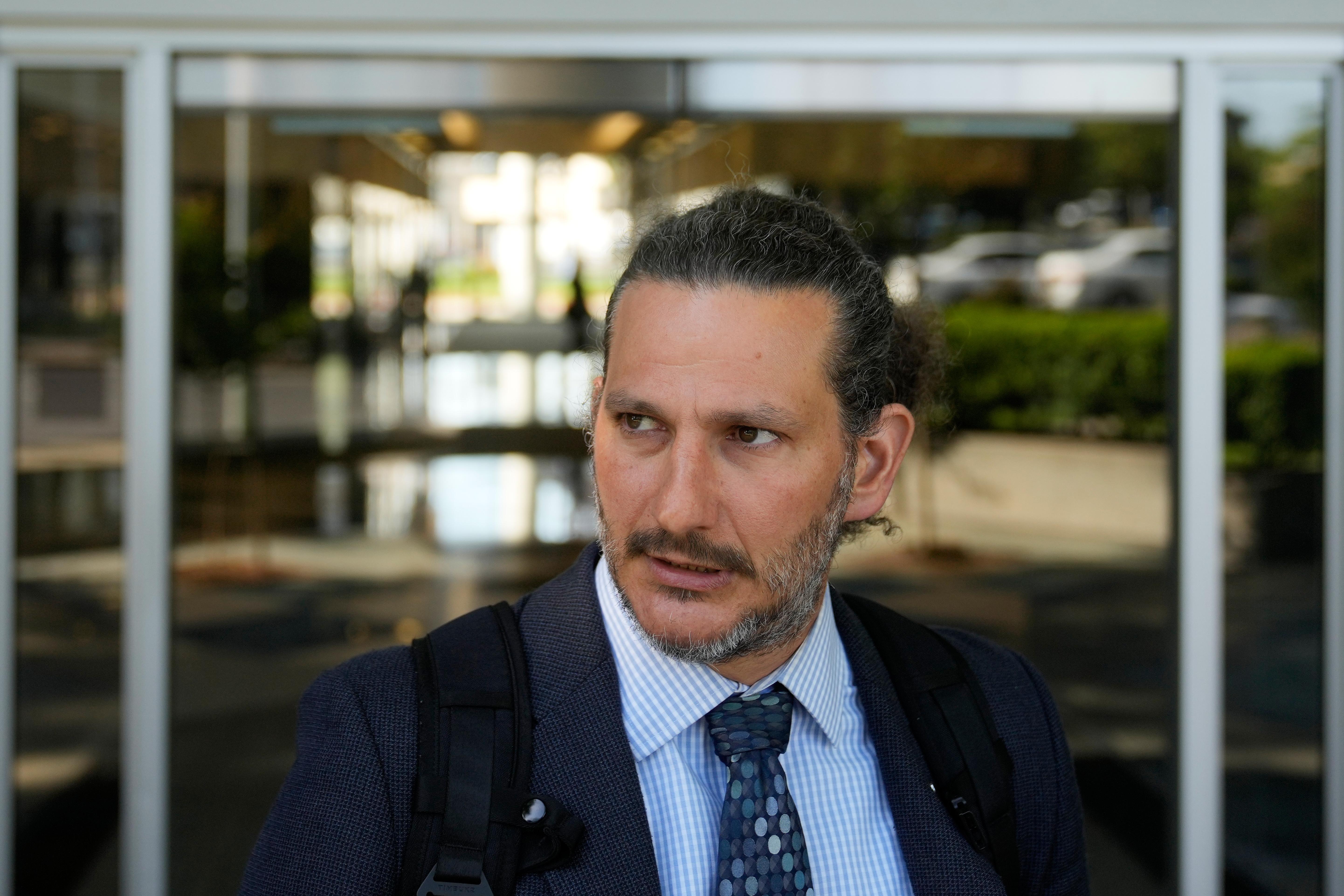 Attorney Judah Lakin is interviewed outside of Immigration Court Tuesday,...