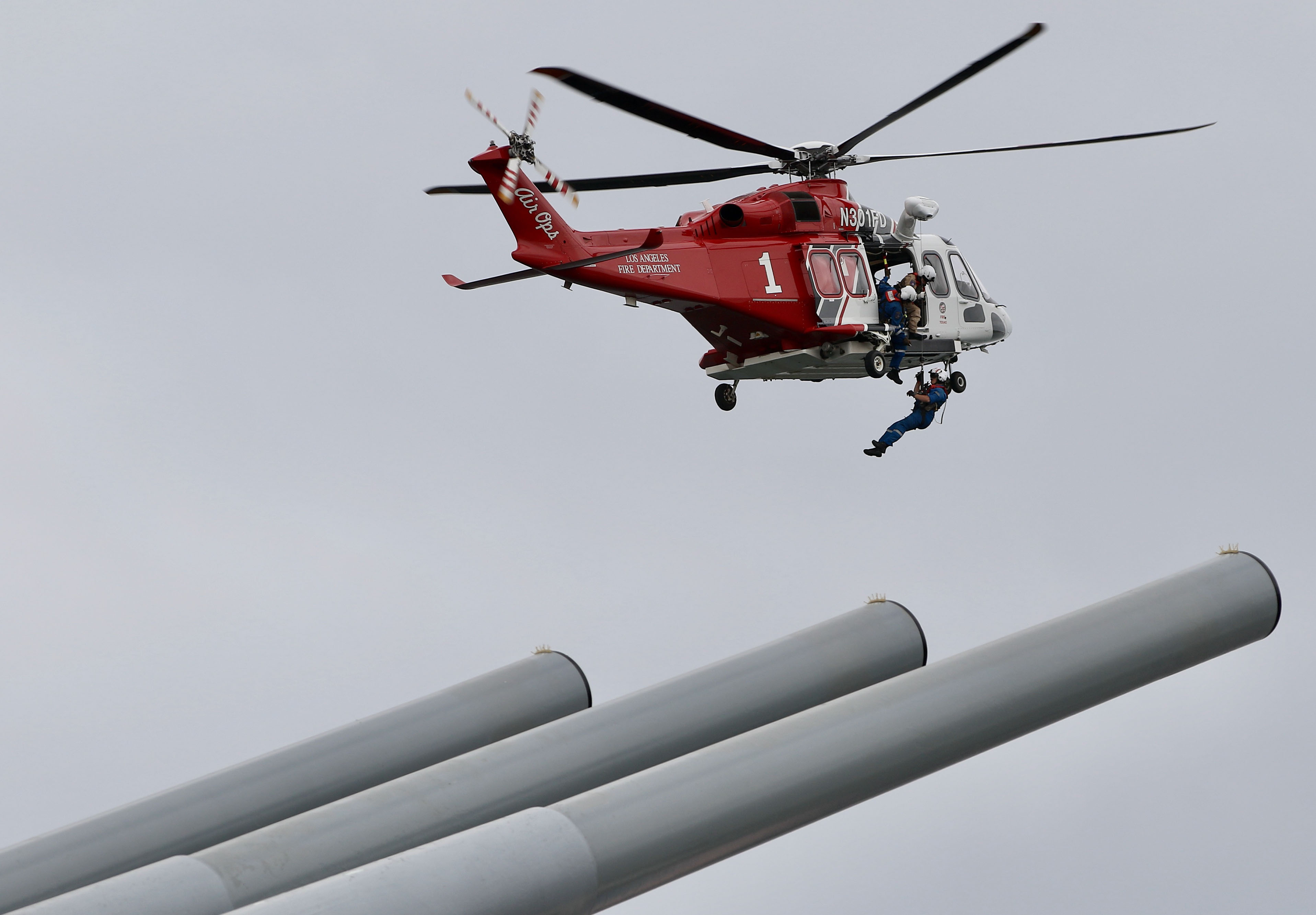 A Los Angeles Fire Department AW 139 helicopter crew performs...