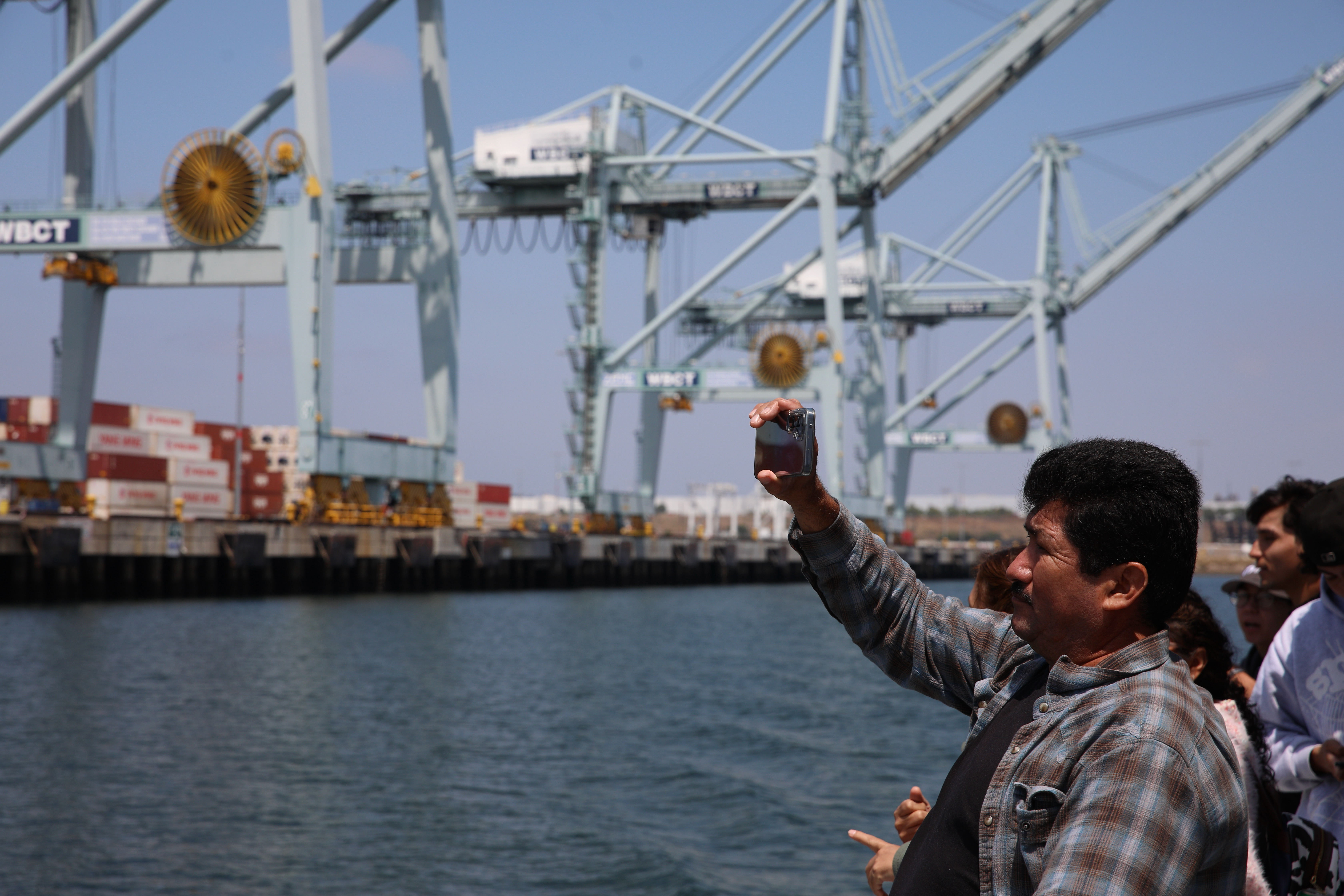 Passengers get close-up views of the ports of Long Beach...