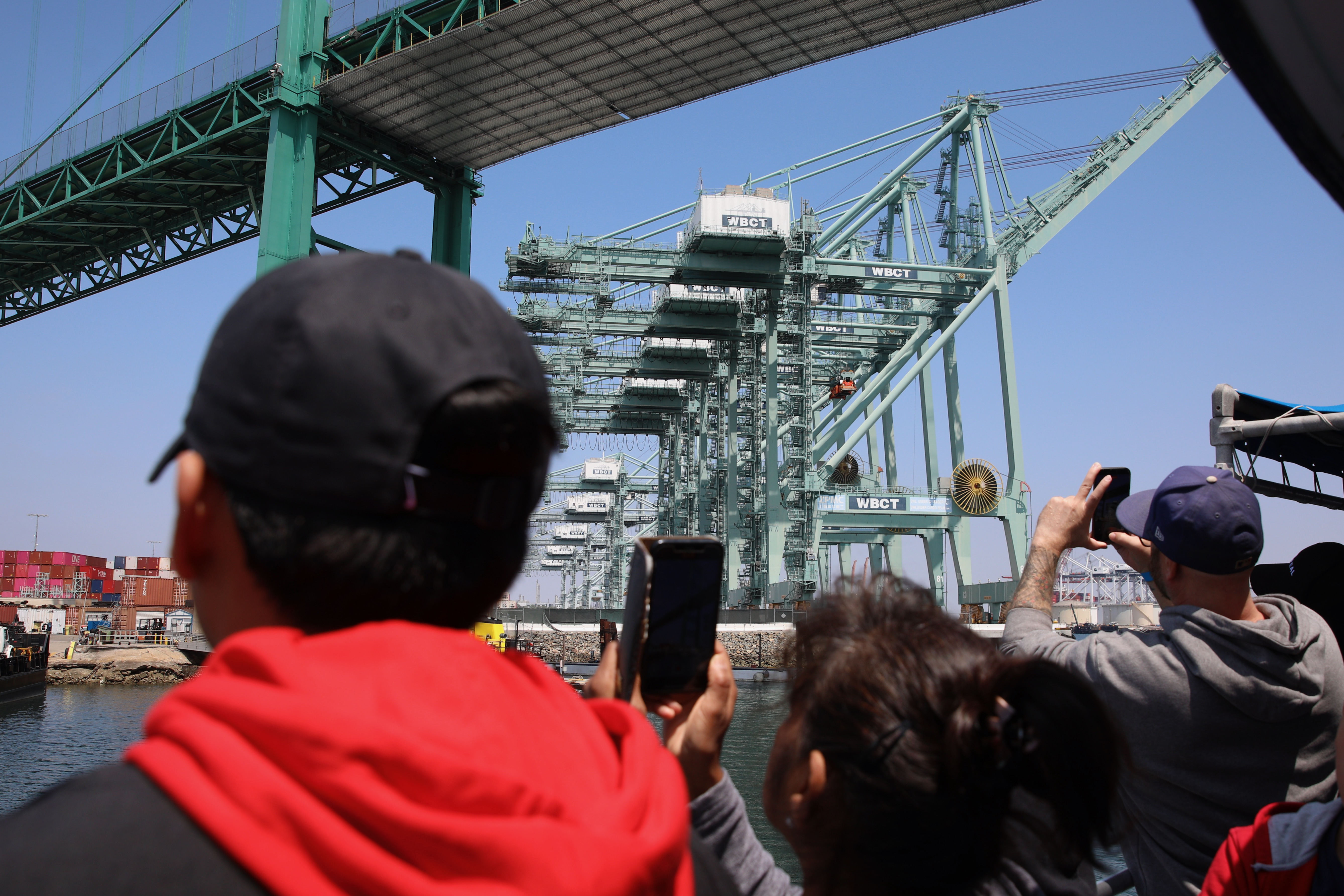 Passengers get close-up views of the ports of Long Beach...