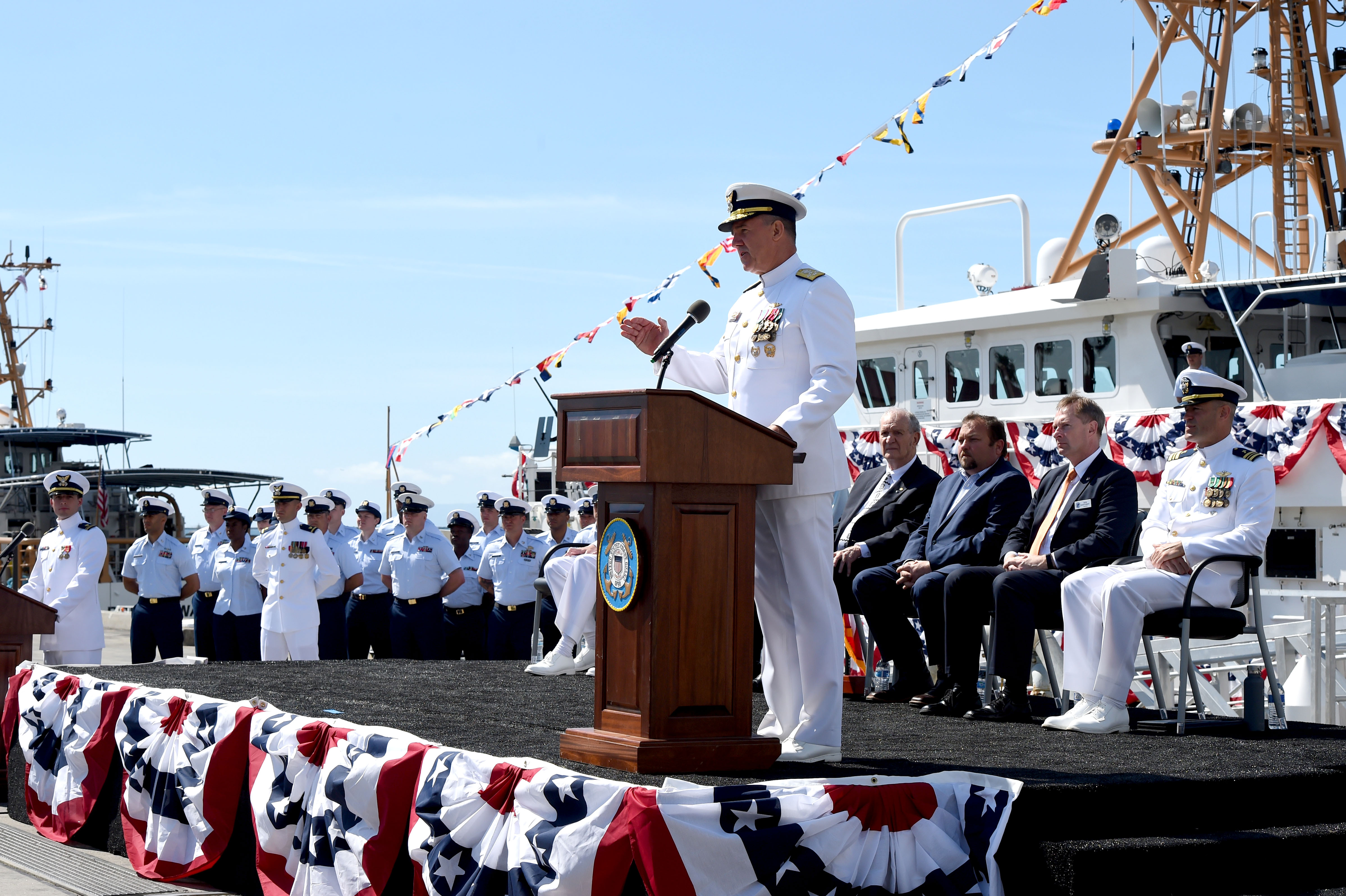 Admiral Karl L Schultz speaks to the crowd gathered for...
