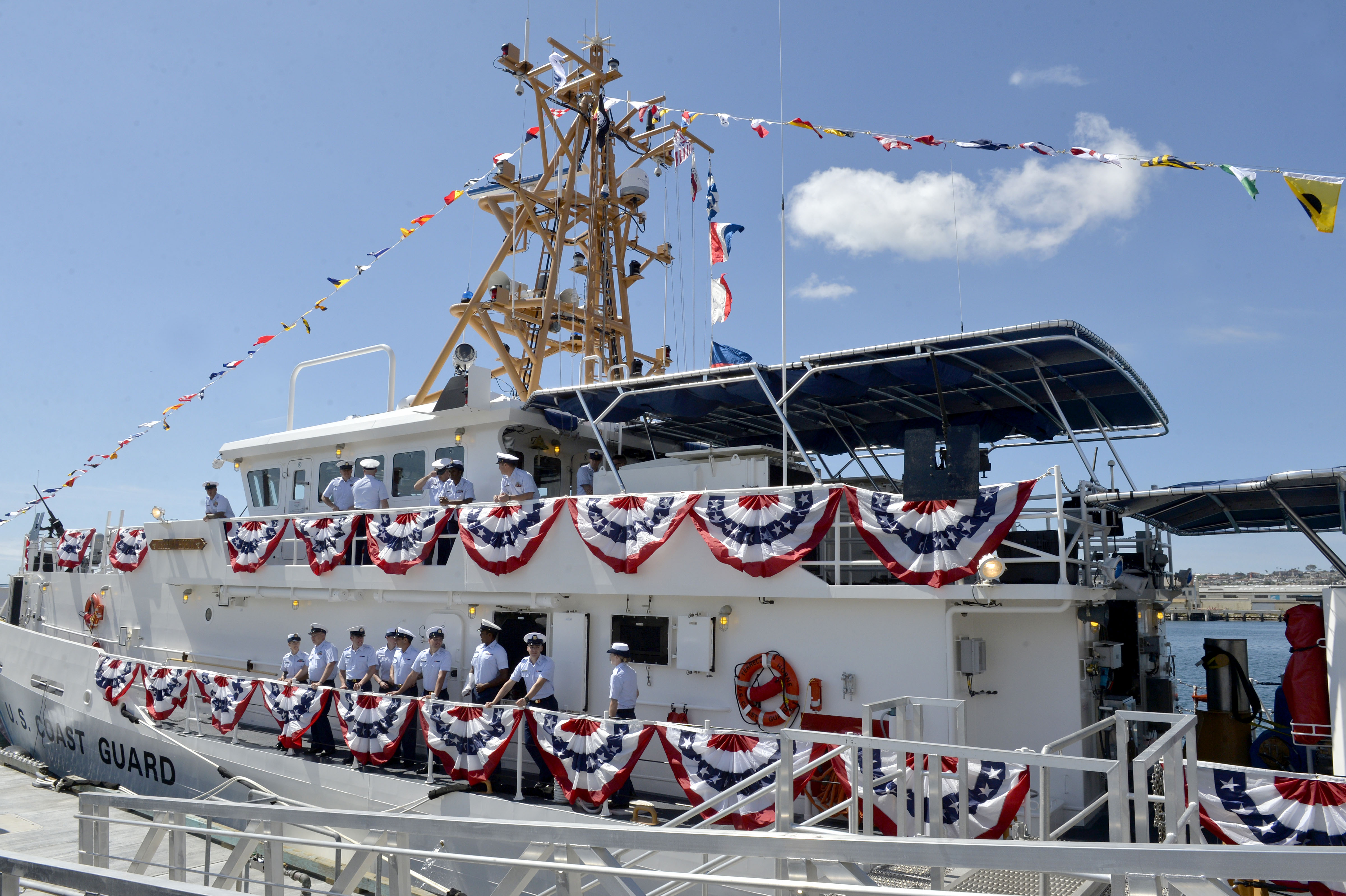 The crew on board during the commissioning ceremony for the...