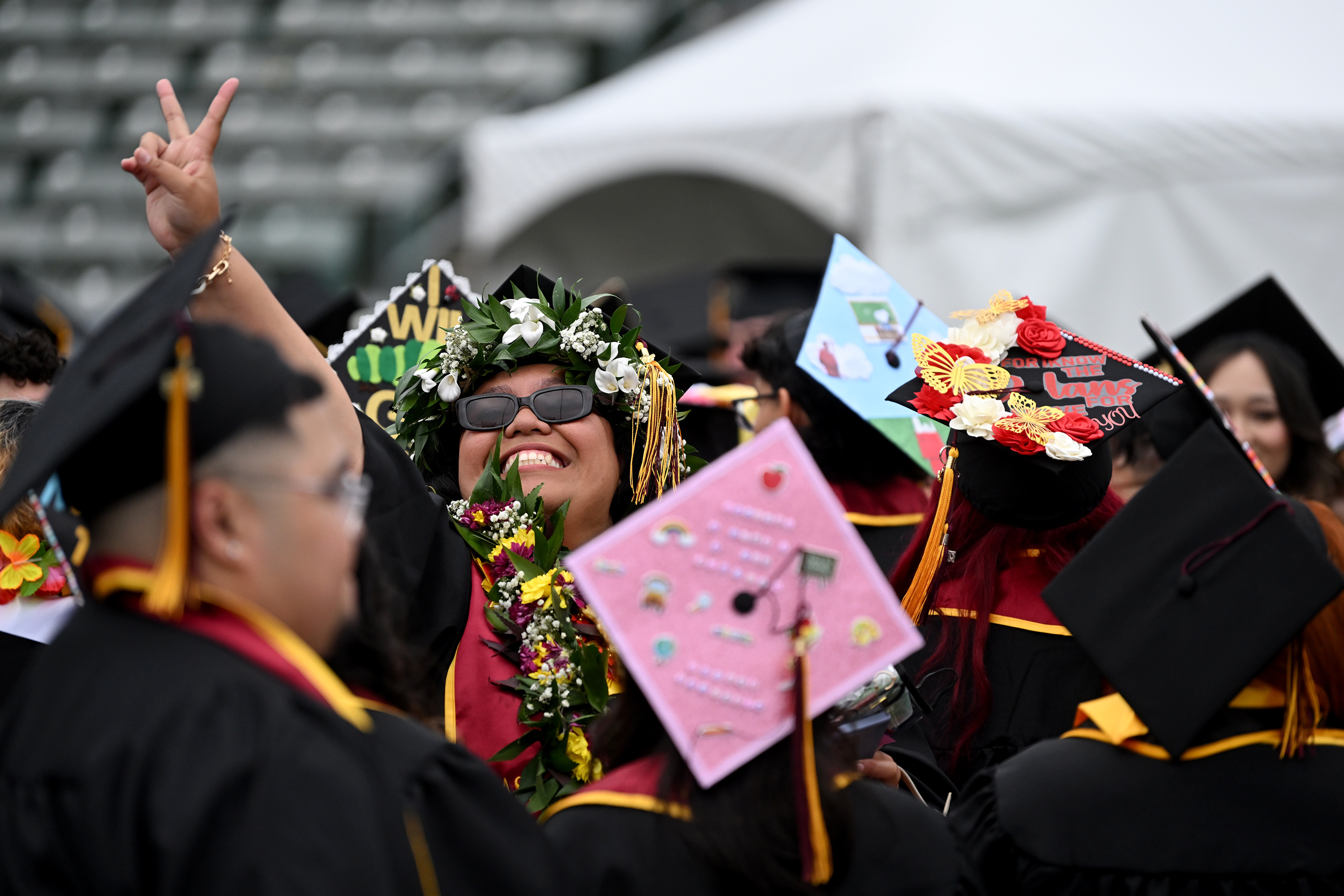 Priscilla Tuuholoaki waves to family during California State University Dominguez...