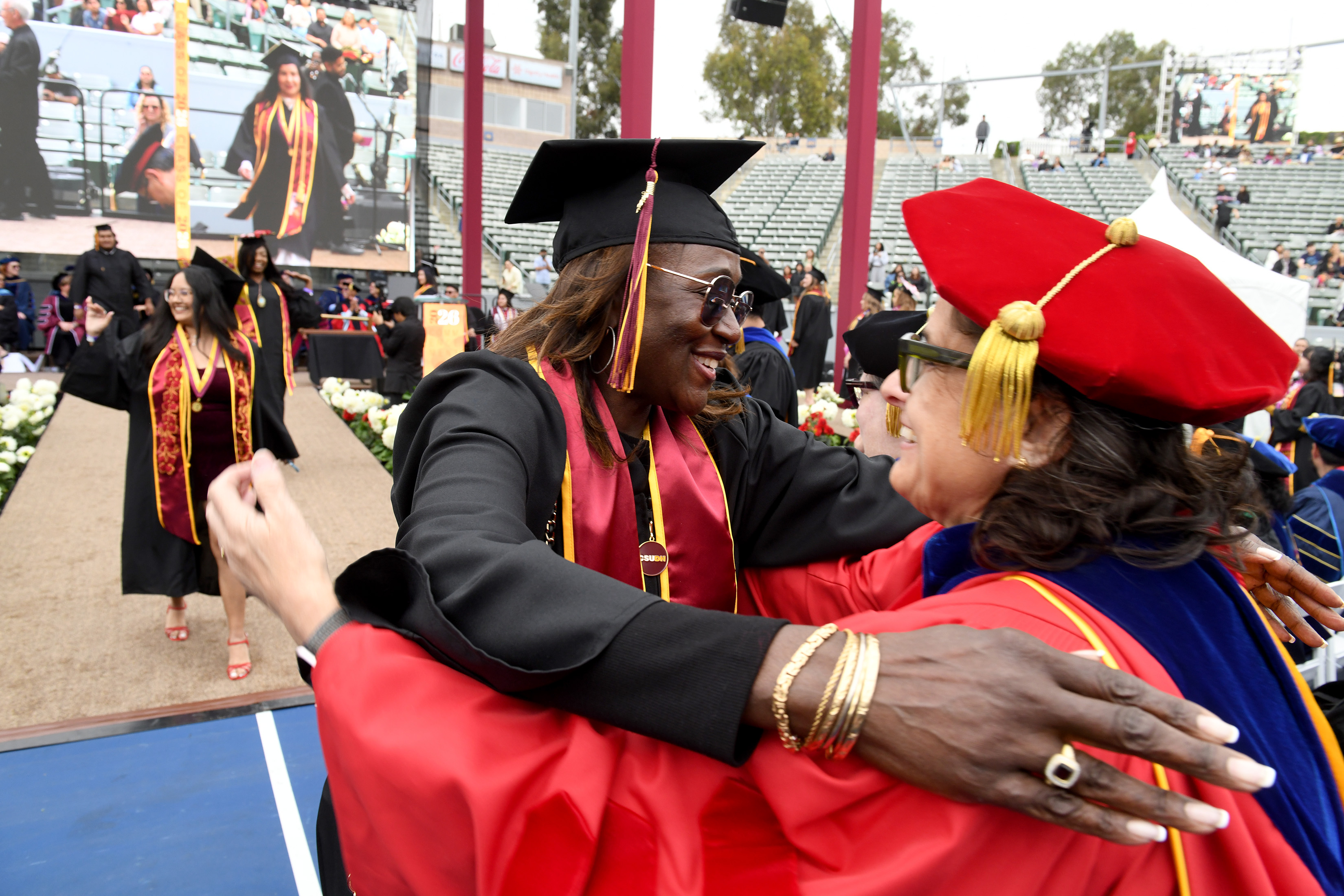 Debra Van Kallen celebrates her graduation during California State University...
