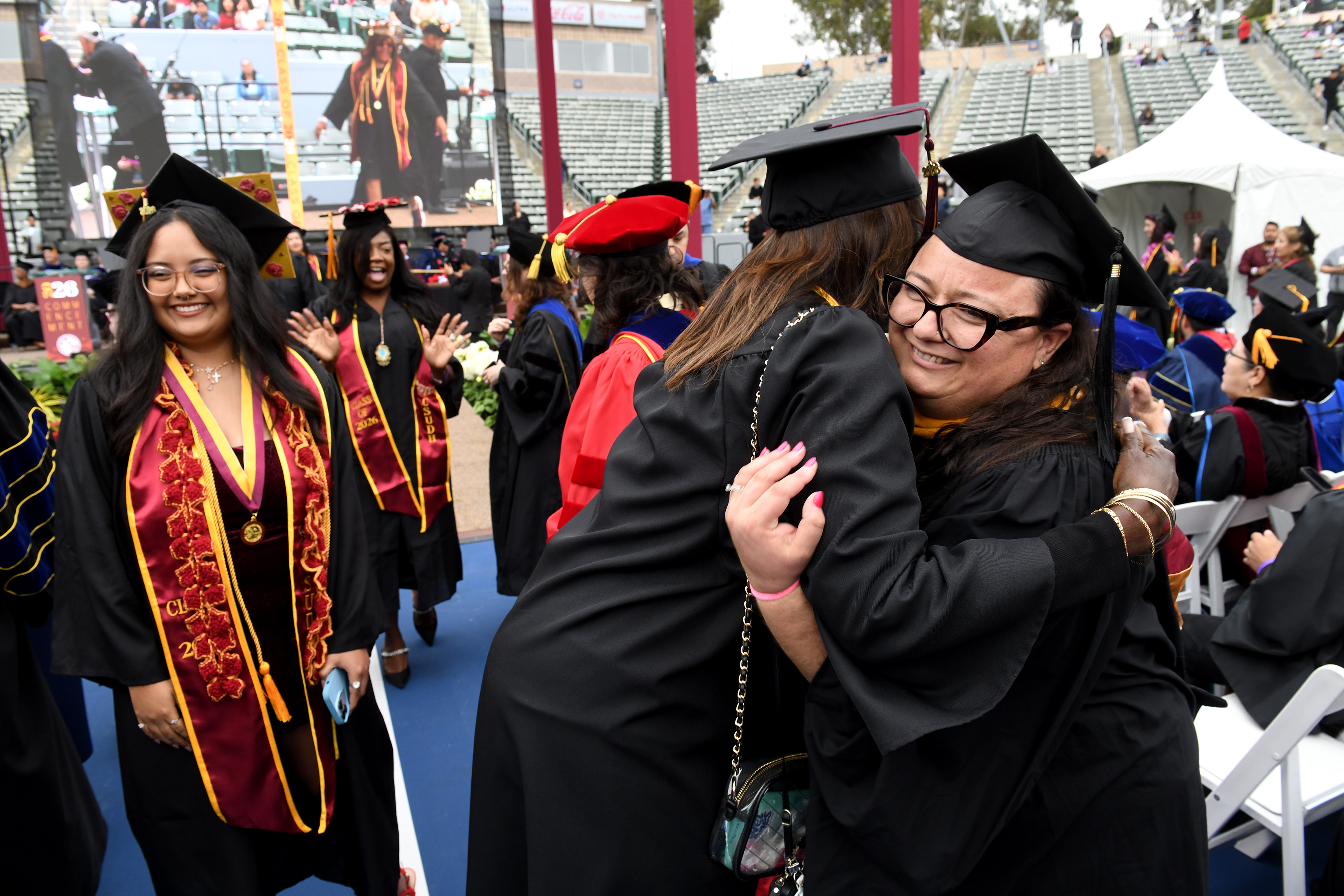 Debra Van Kallen celebrates her graduation during California State University...