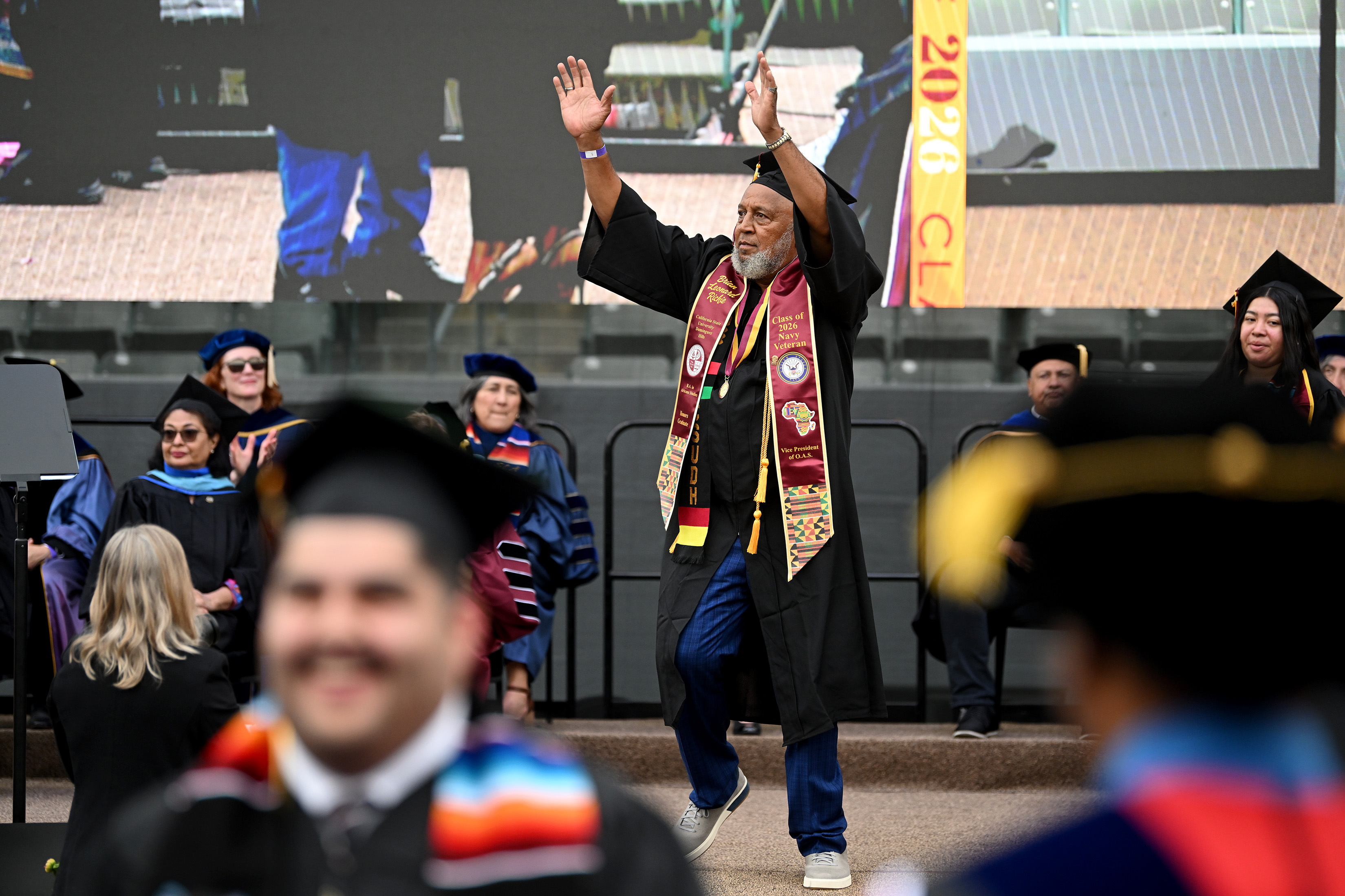 Brian Leonard Richie celebrates his graduation during California State University...