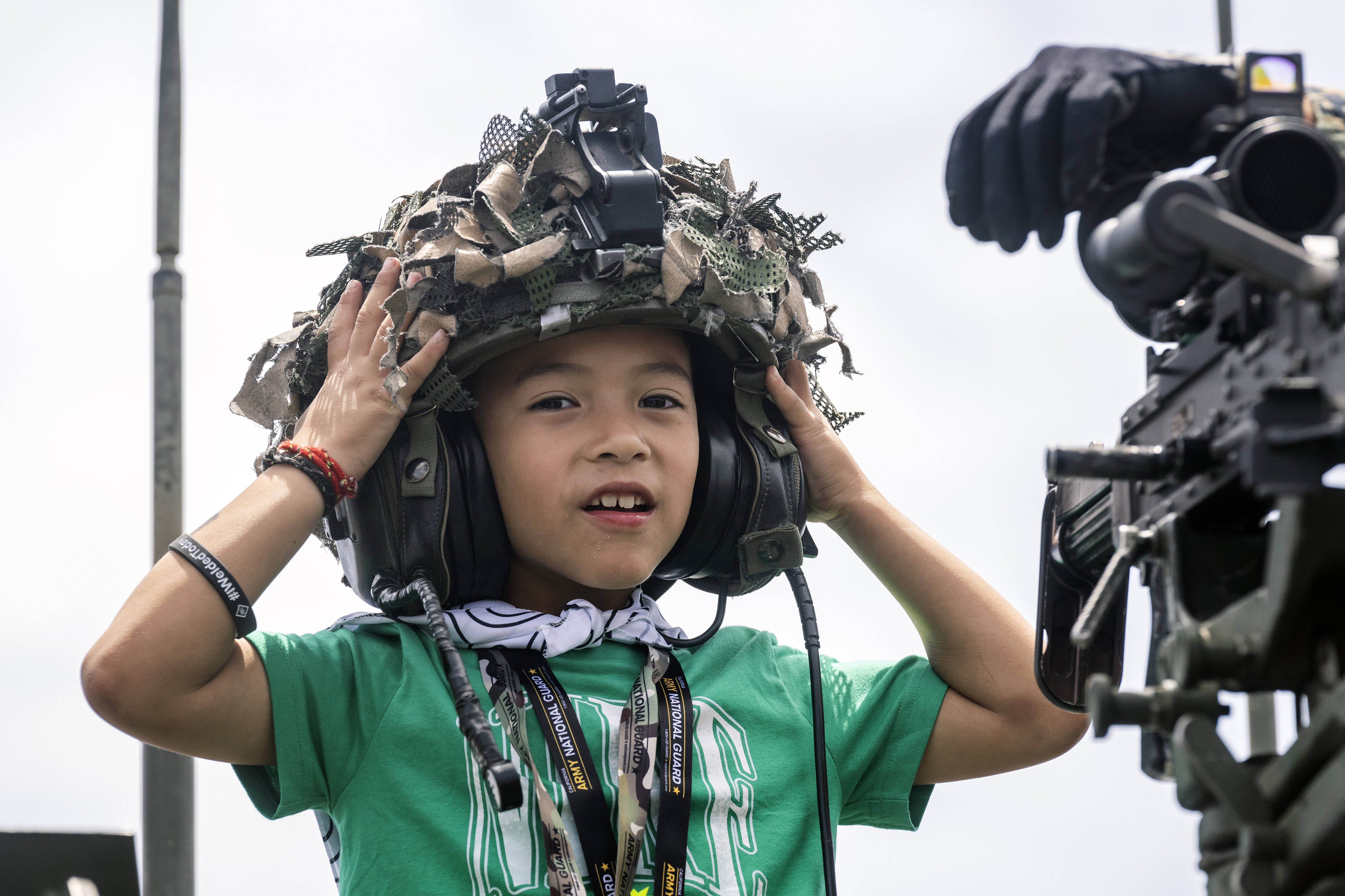 Six-year-old Mattson Marsteller tries on a CVC helmet during day...