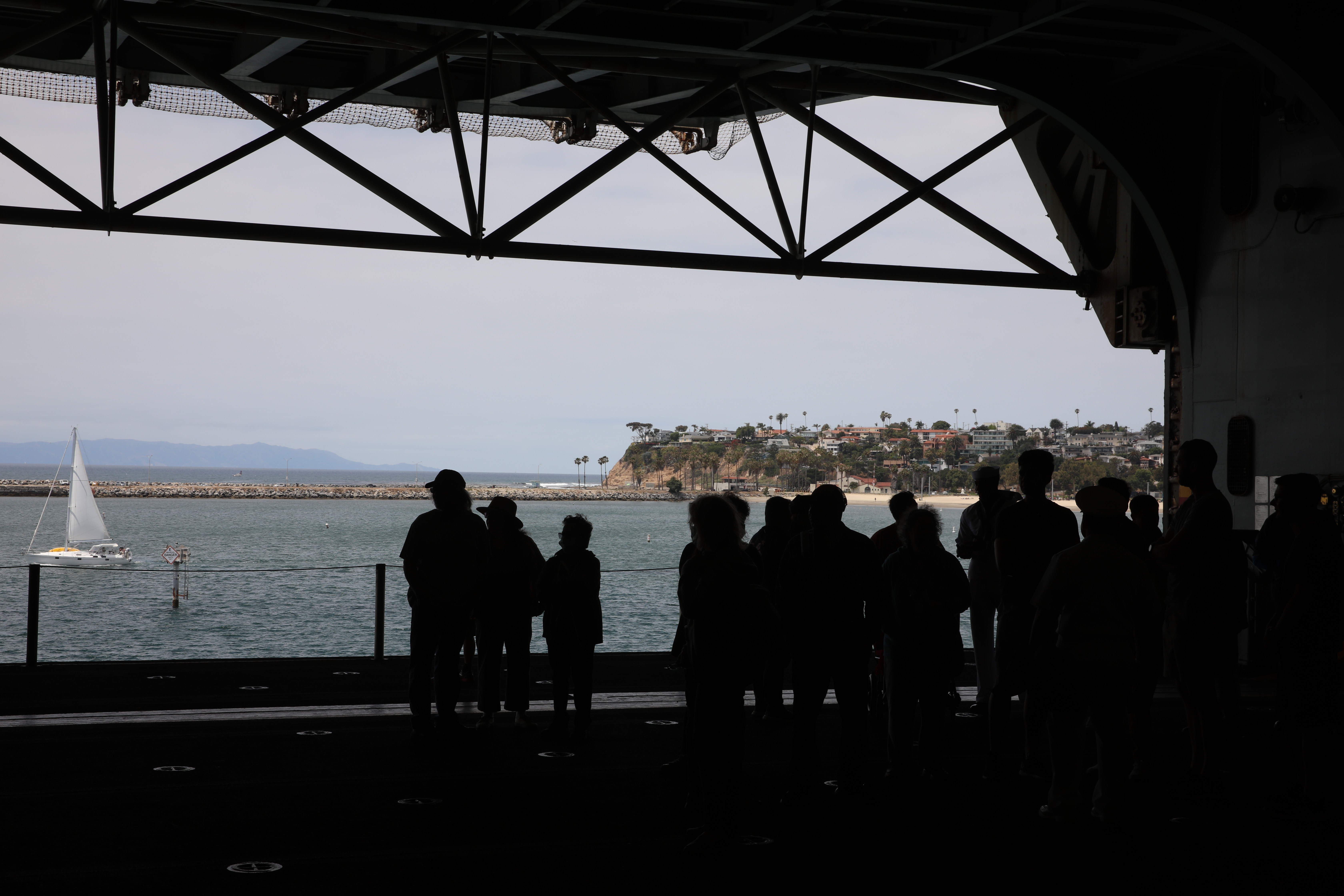 Visitors tour the Hangar Bay of the USS Essex on...