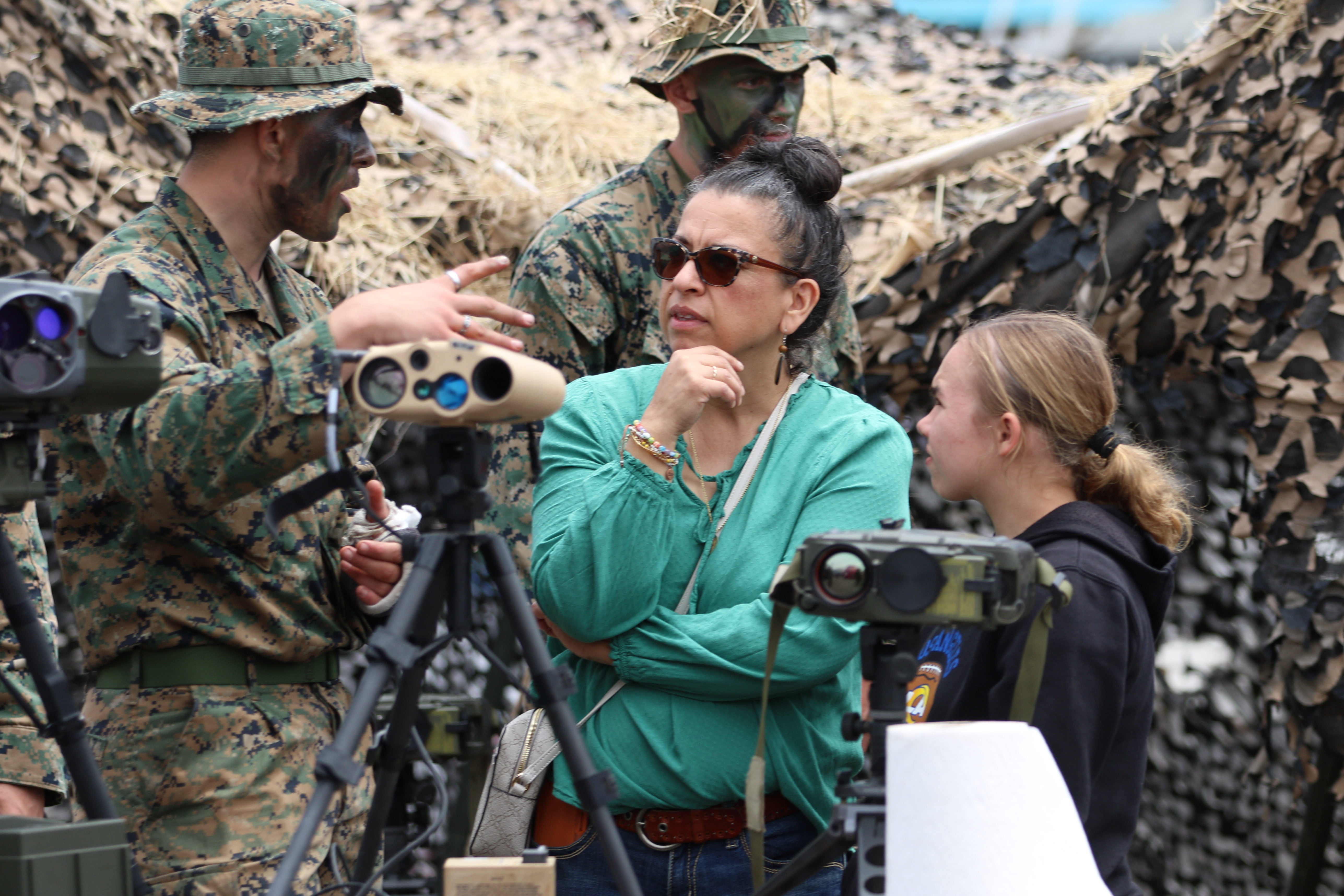 Attendees have the opportunity to chat with military personnel on...