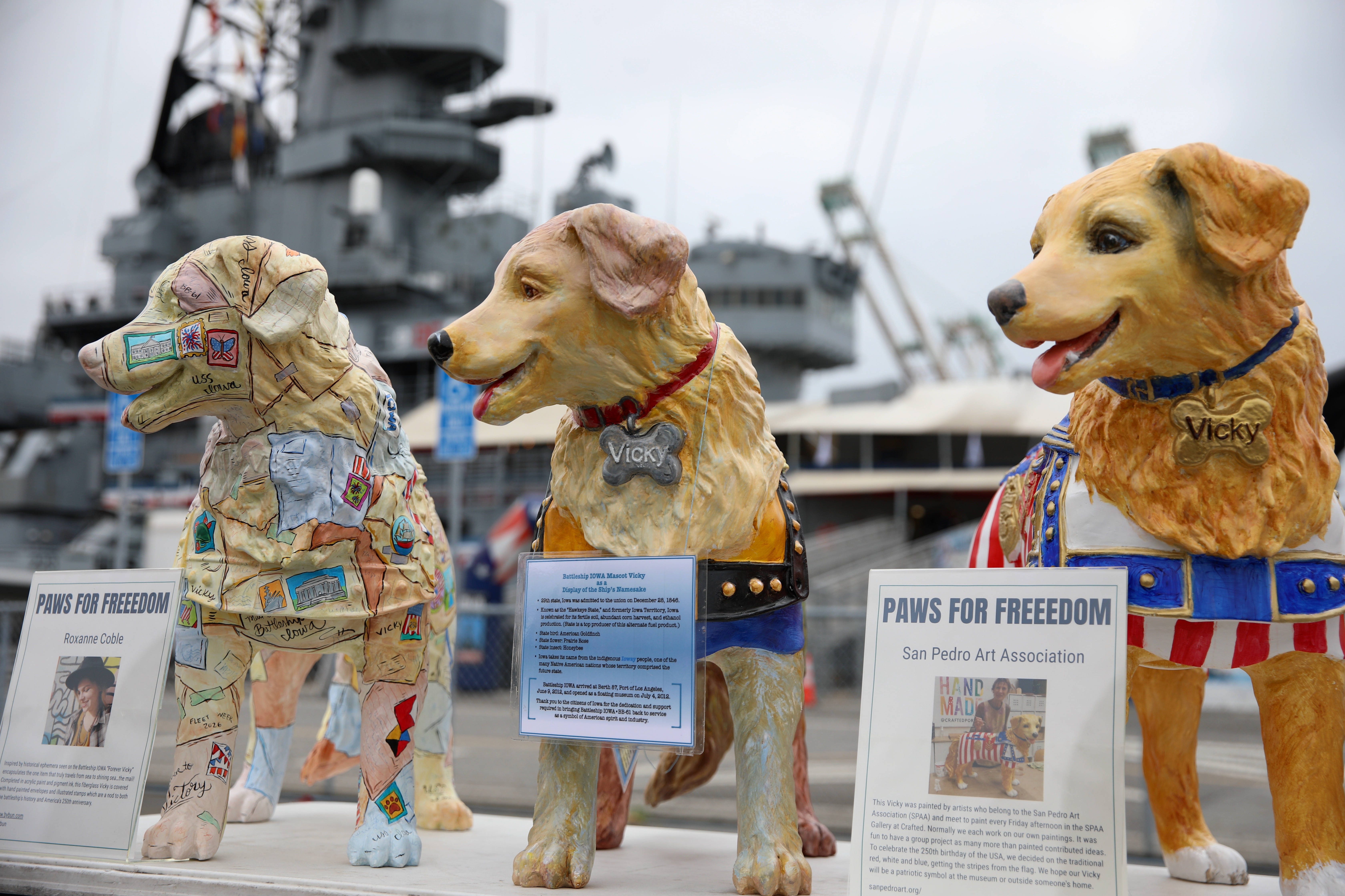 Statues of the USS Iowaâs mascot, Vicky the Dog, are...