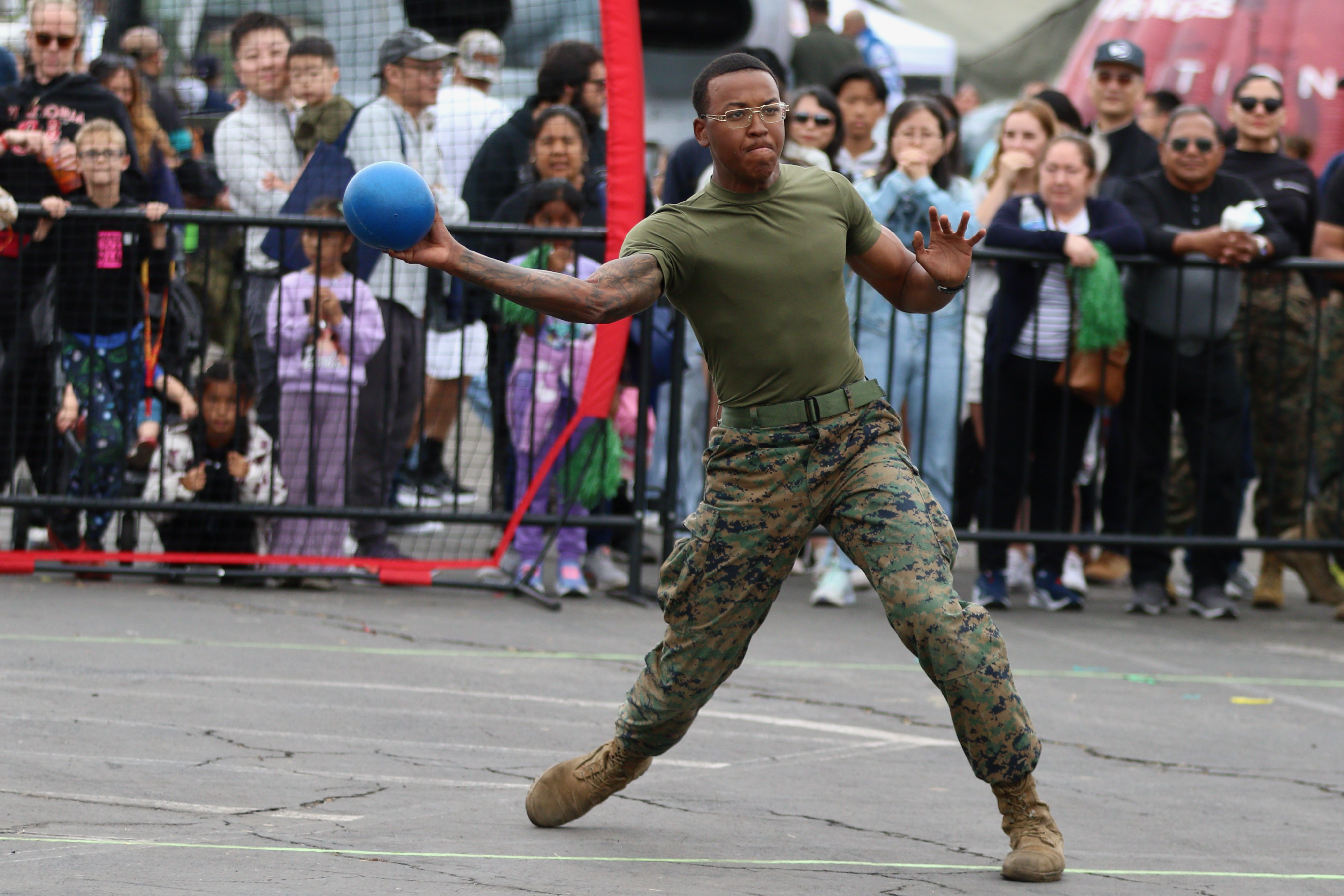 LCpl. Demarcus Reed competes for a team of Marines in...