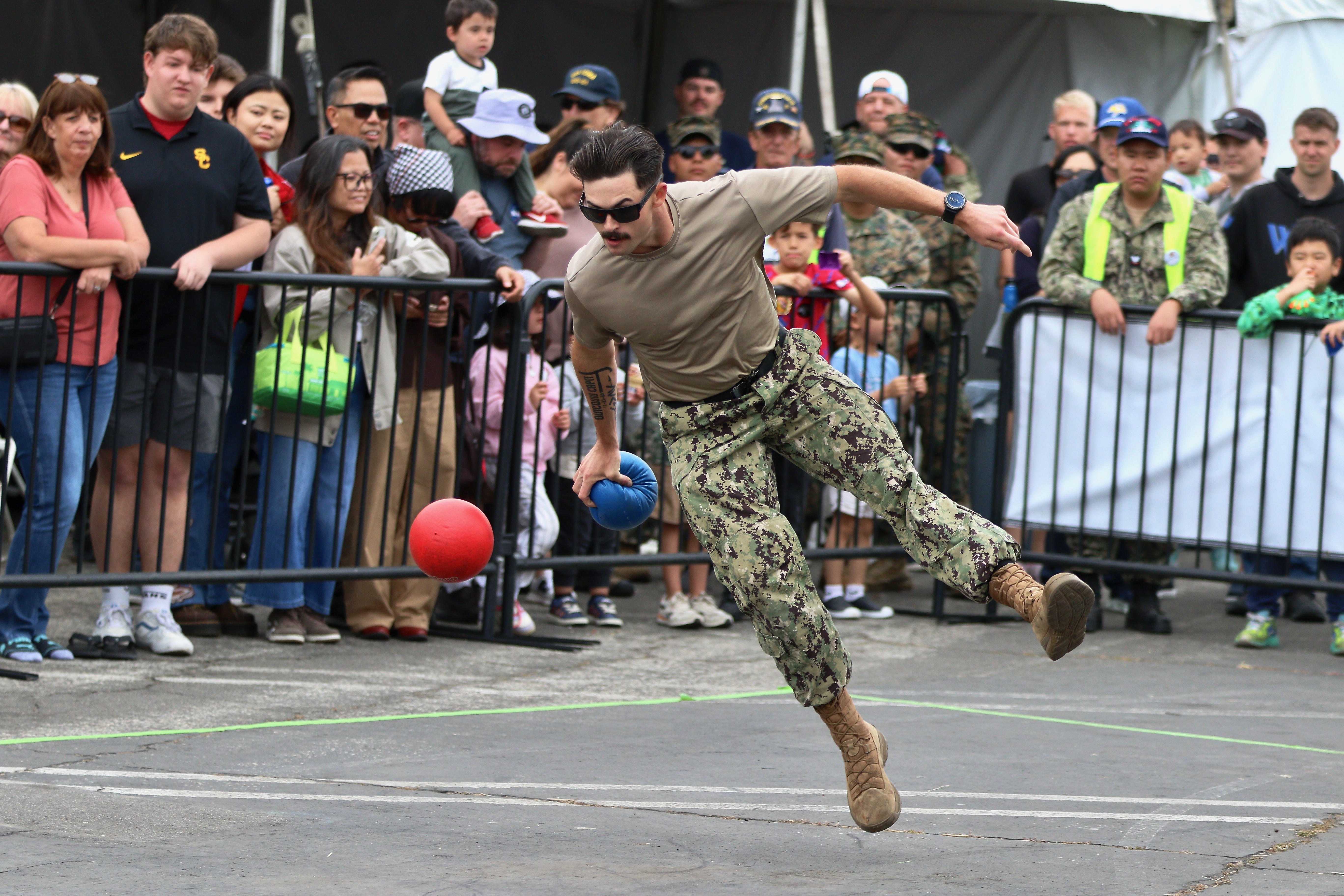 Players compete in the military dodgeball tournament on Sunday, May...