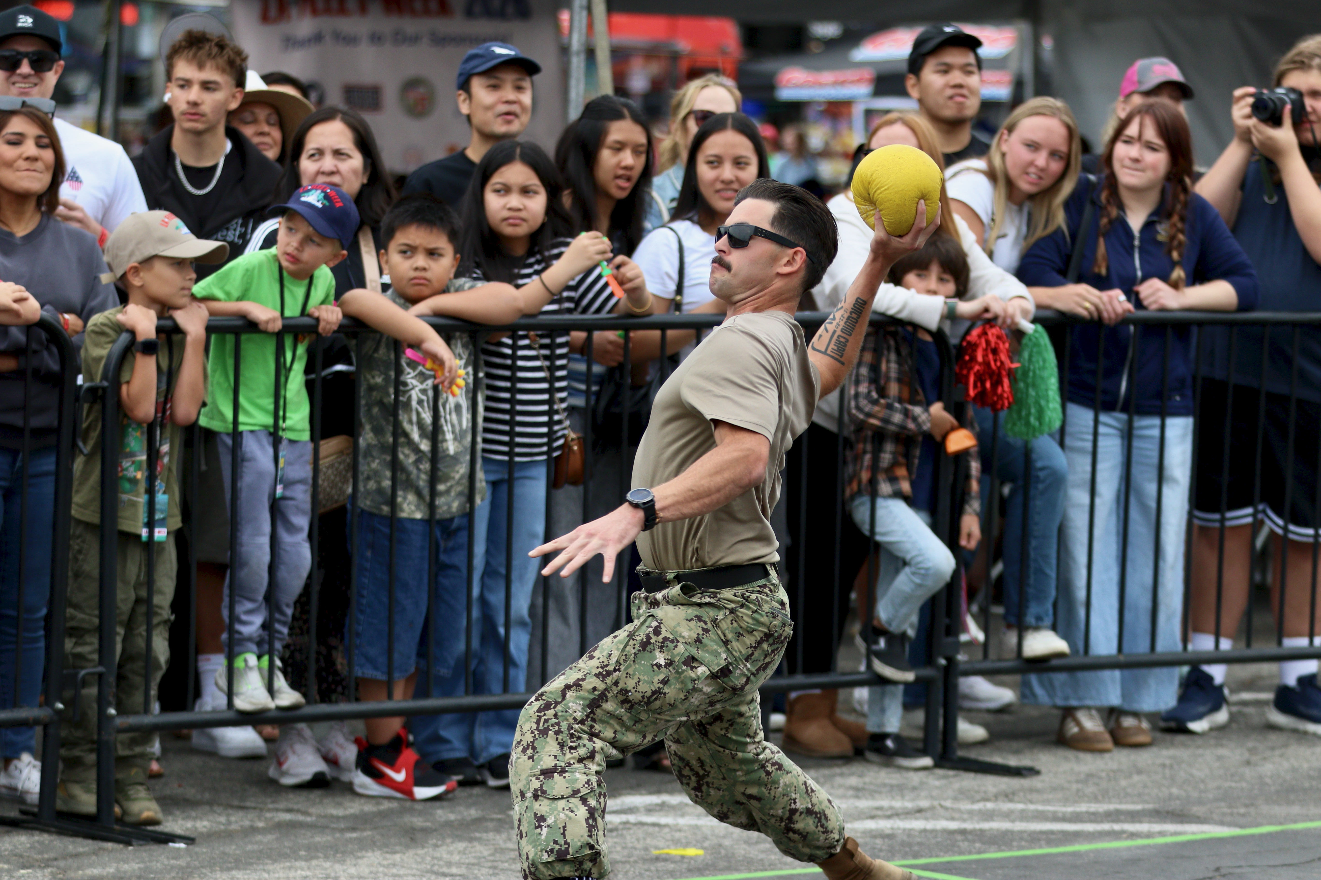 Players compete in the military dodgeball tournament on Sunday, May...