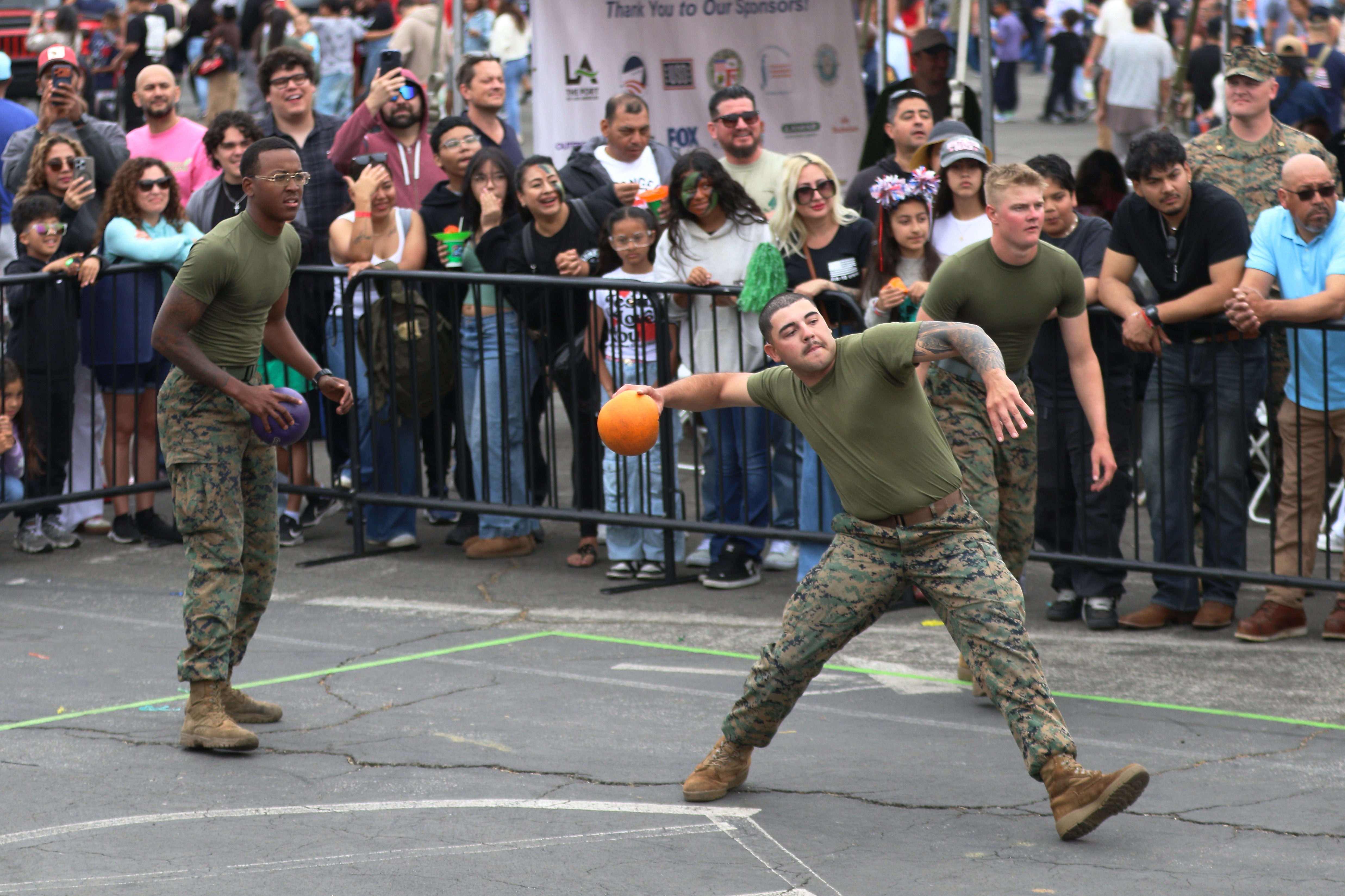 Players compete in the military dodgeball tournament on Sunday, May...