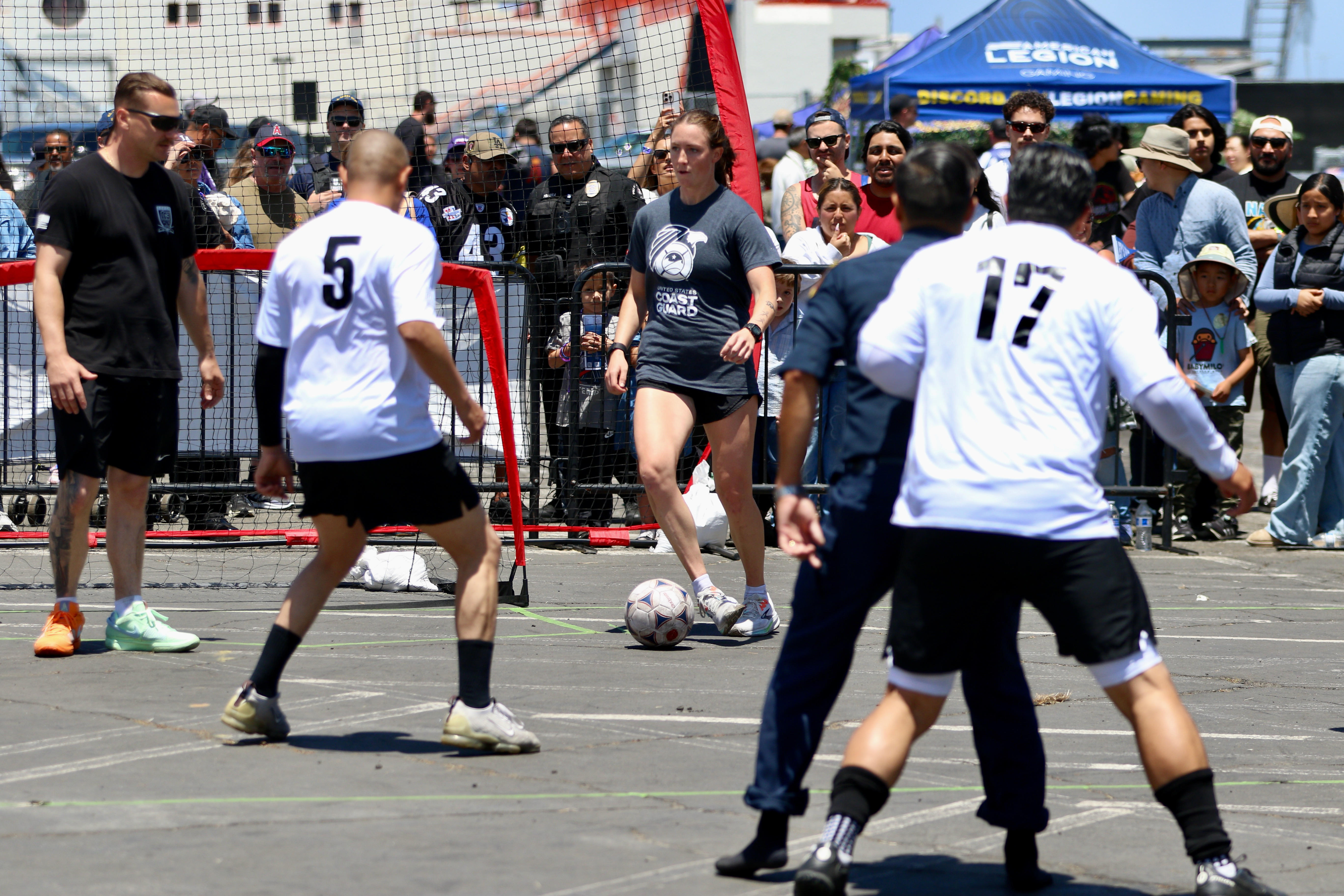 Players from the military and law enforcement compete in a...