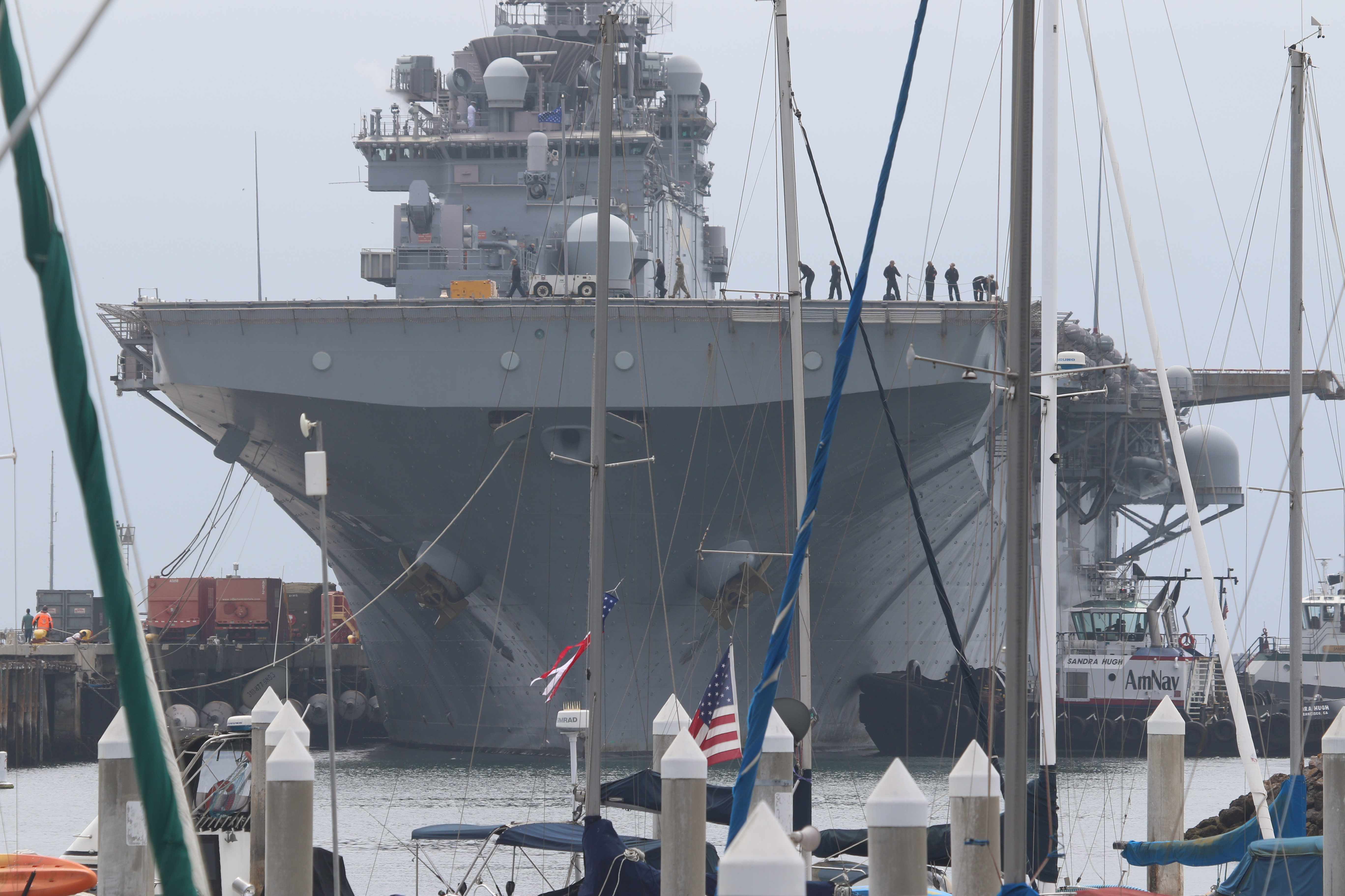 Helicopter carrier the USS Essex towers over the Cabrillo Marina...