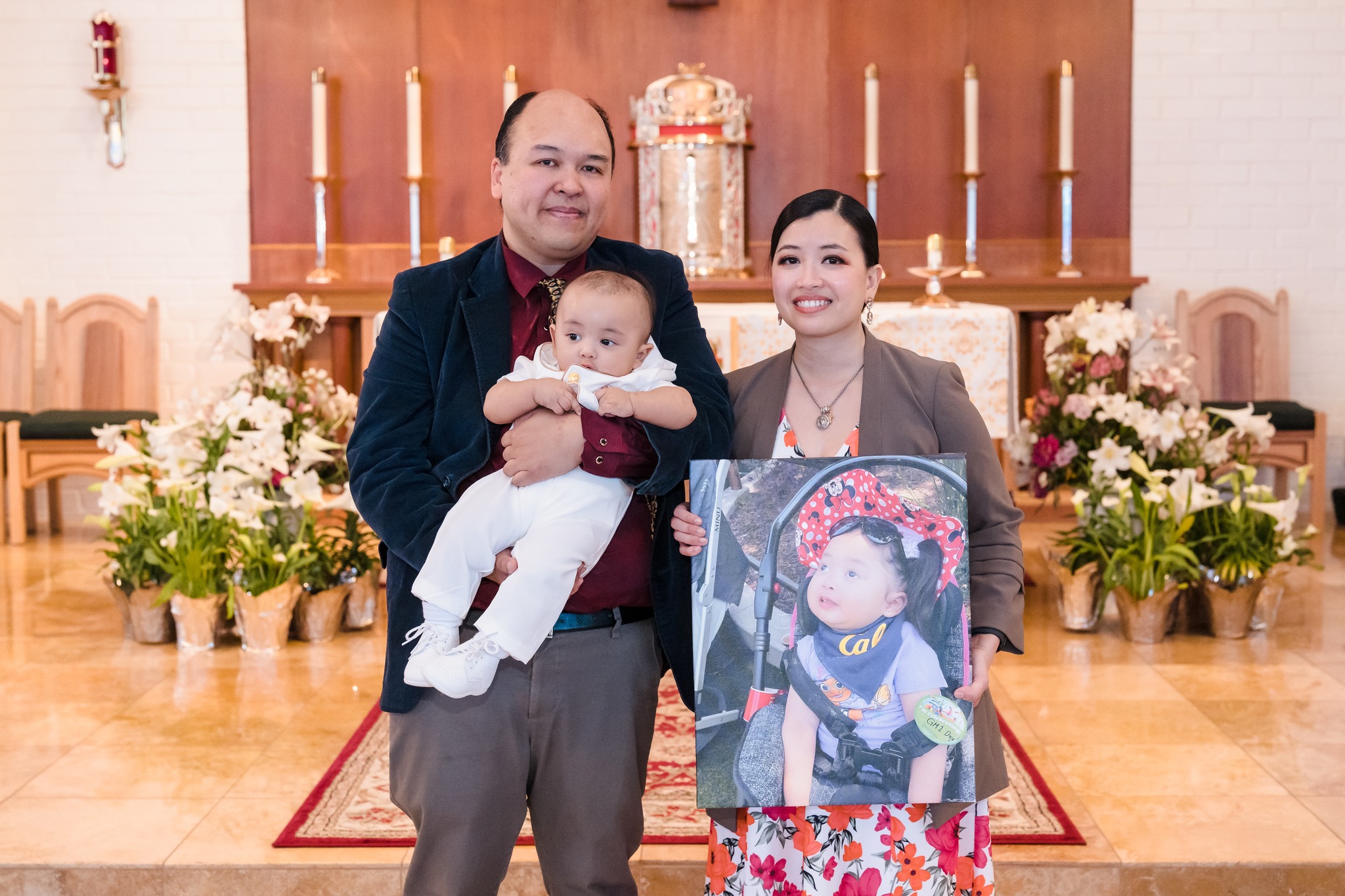 David Law with his wife Veena Sison-Law and his son...