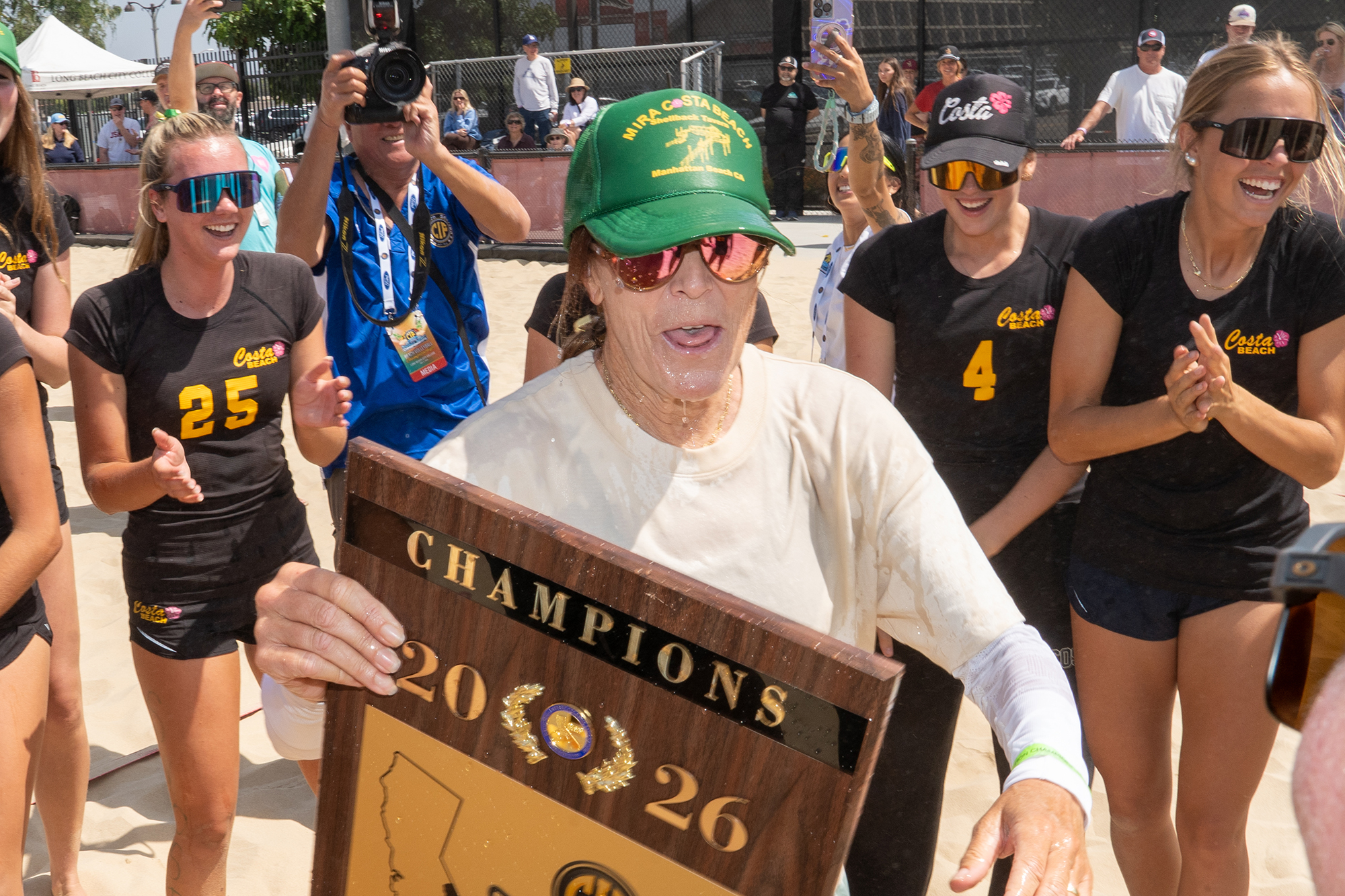 Nancy Reynolds, coach of Mira Costa High School, celebrates with...