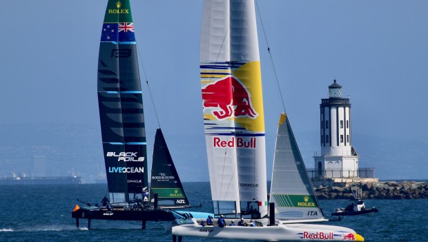 Teams from Spain and Canada compete aboard F50 hydrofoiling catamarans during the Los Angeles Sail GP on Saturday, Mar. 15, 2025, at the Port of LA's Outer Harbor in San Pedro. (Photo by Howard Freshman, Contributing Photographer)