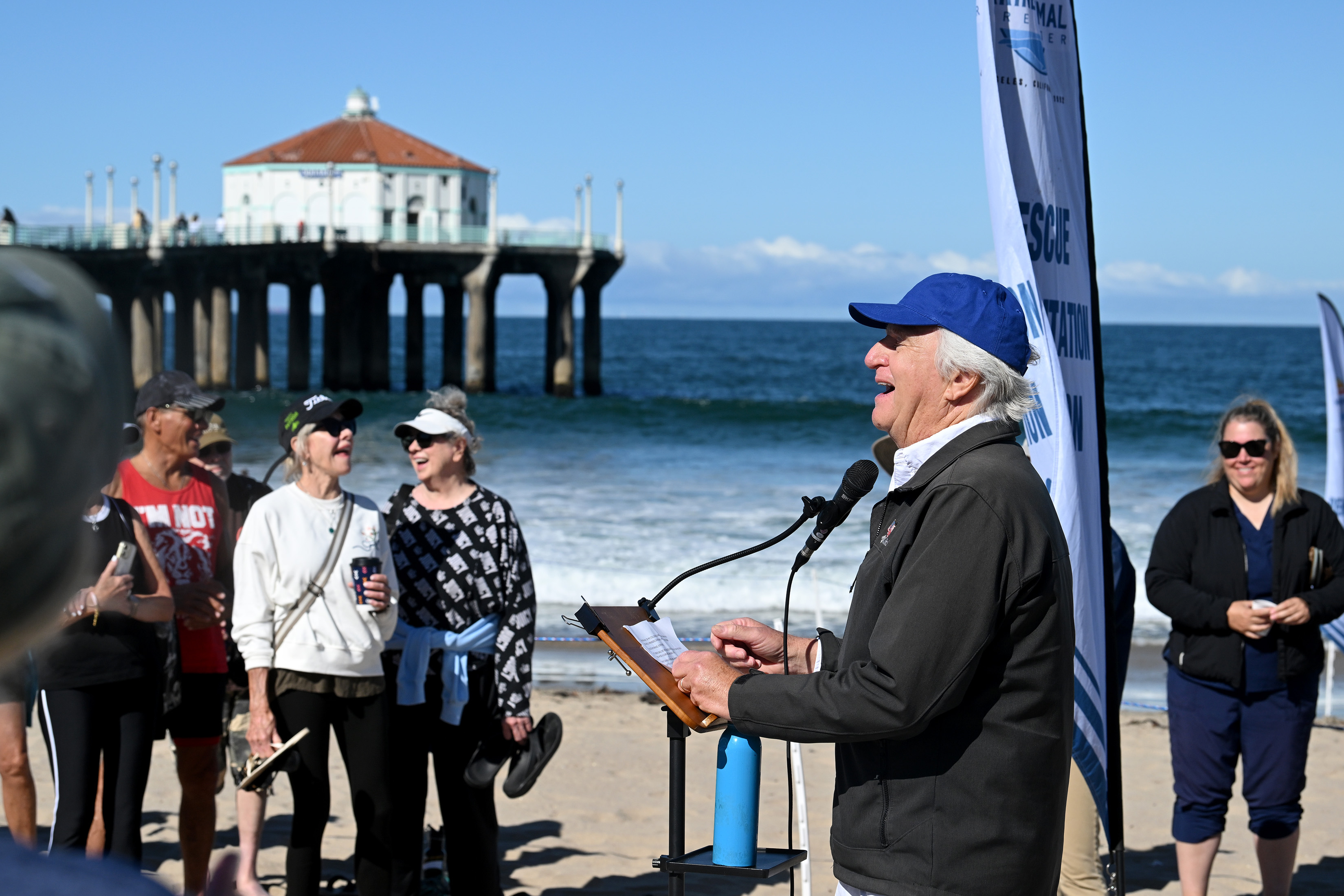 Mayor Joe Franklin joins volunteers with the Marine Mammal Care...