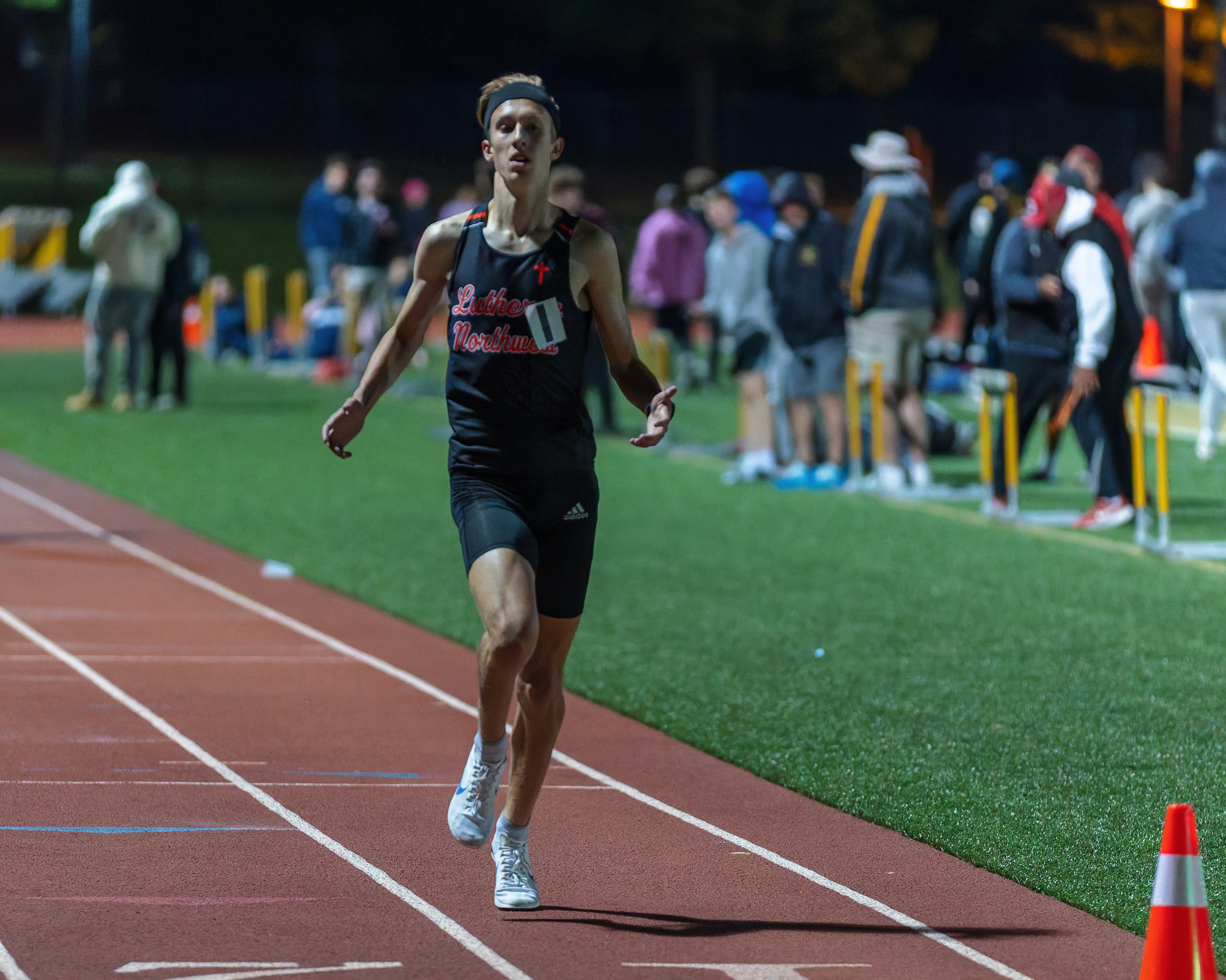 Rochester Hills Lutheran Northwest's Nole Lorenzen wins the boys 3200m...