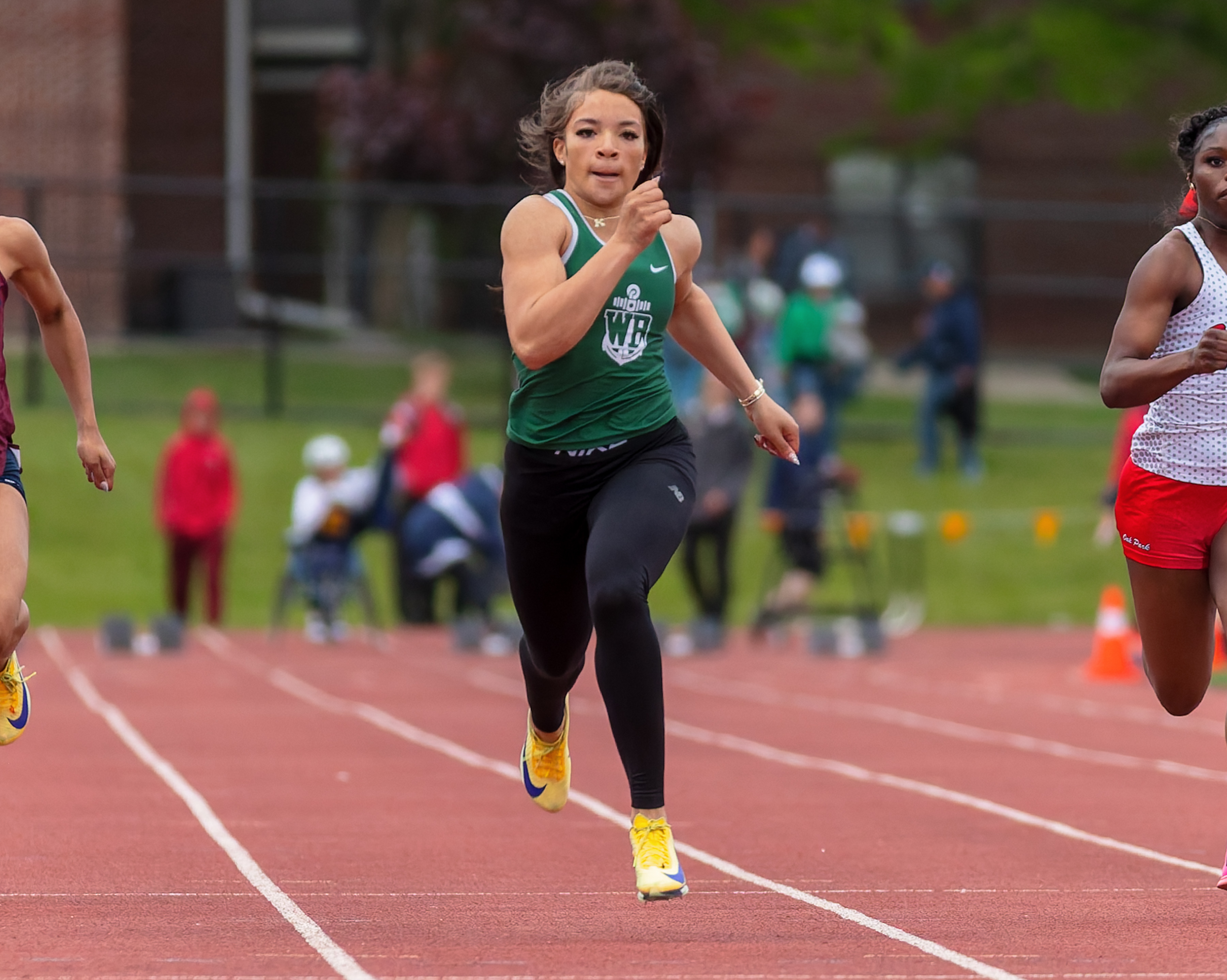West Bloomfield's Kamryn Tatum won the girls 100m during the...